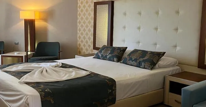 Bed in Beach Club Doganay Hotel - All Inclusive