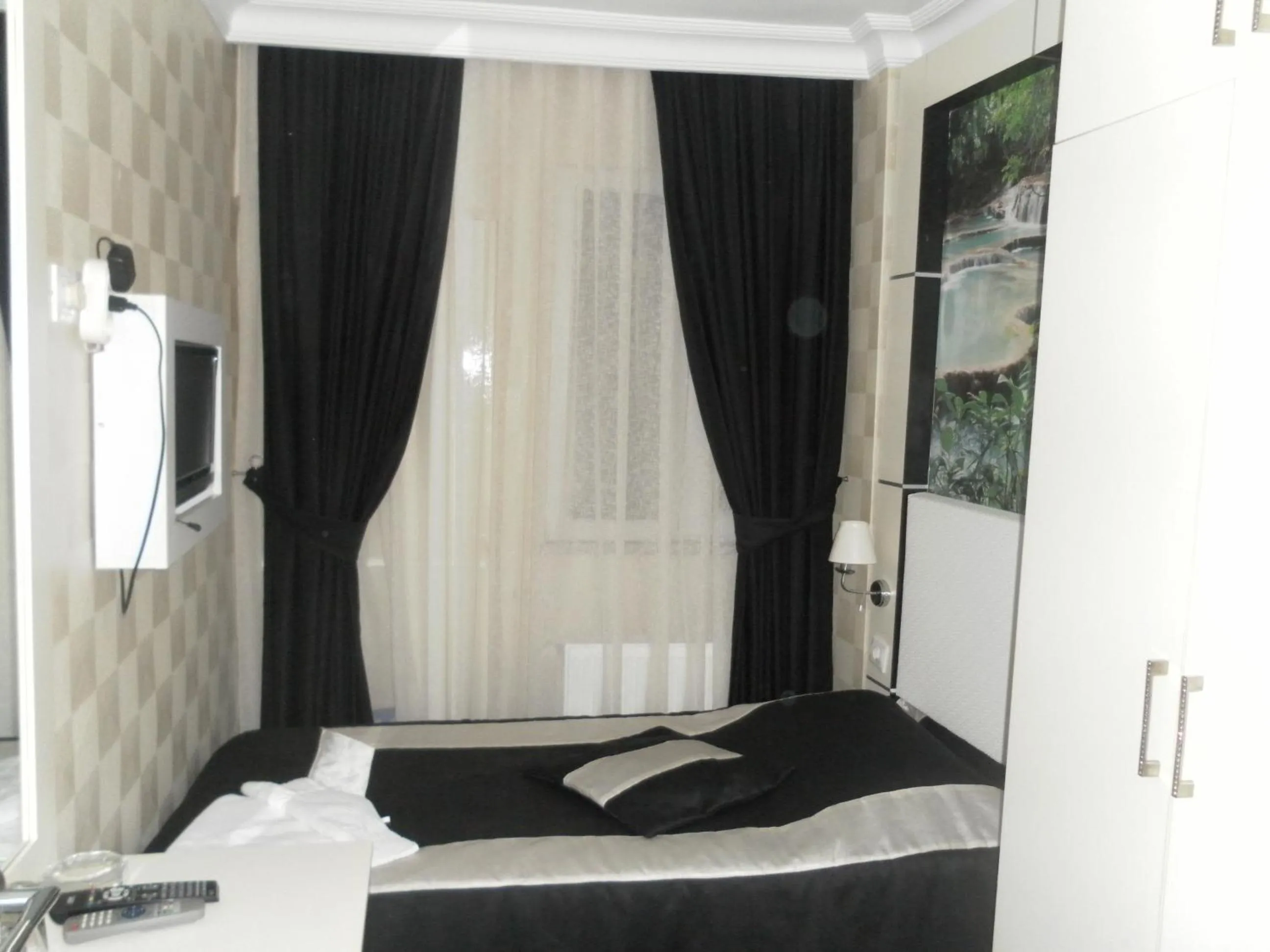 Bedroom in Hotel La White