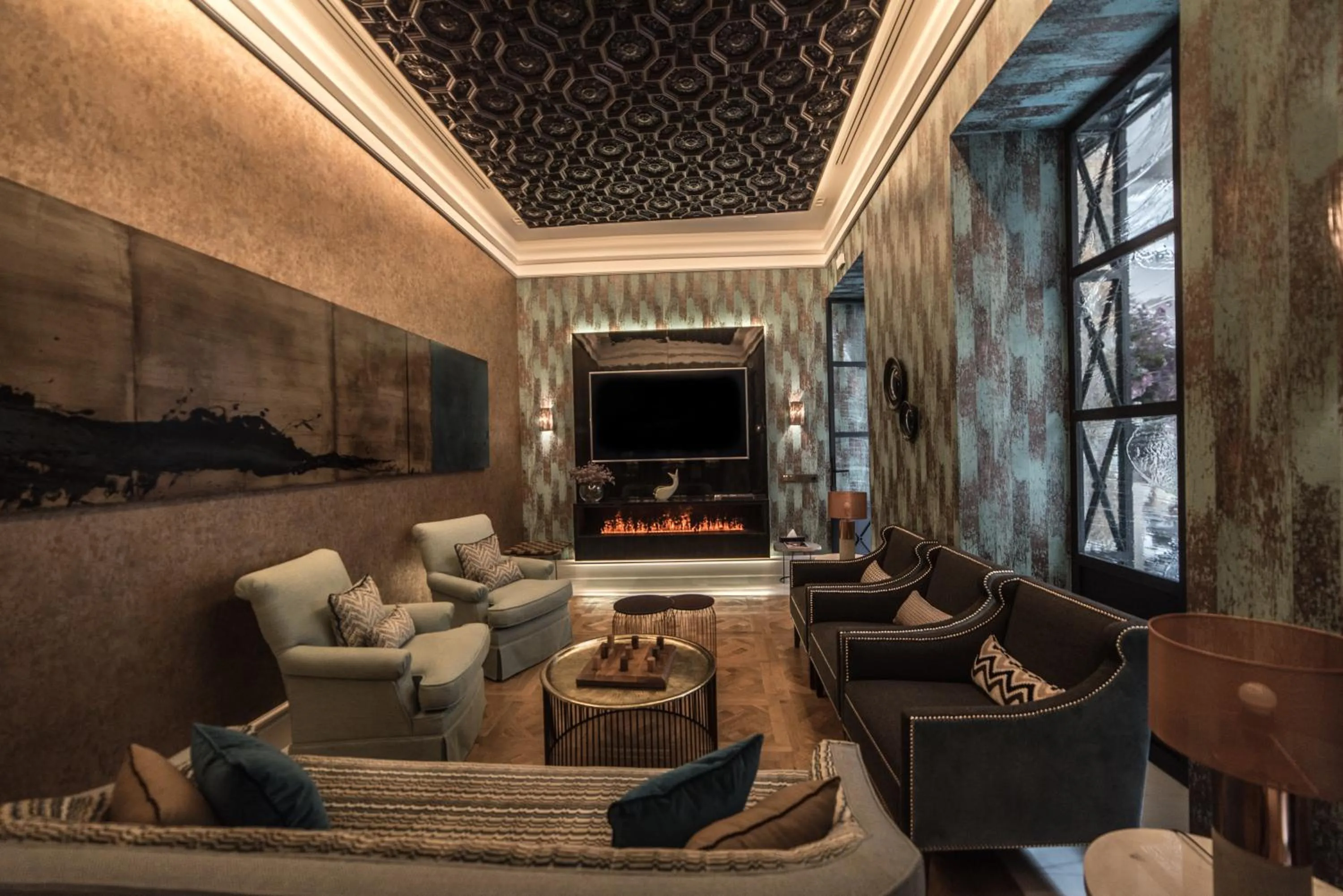 Communal lounge/ TV room in Hotel Casa Palacio María Luisa