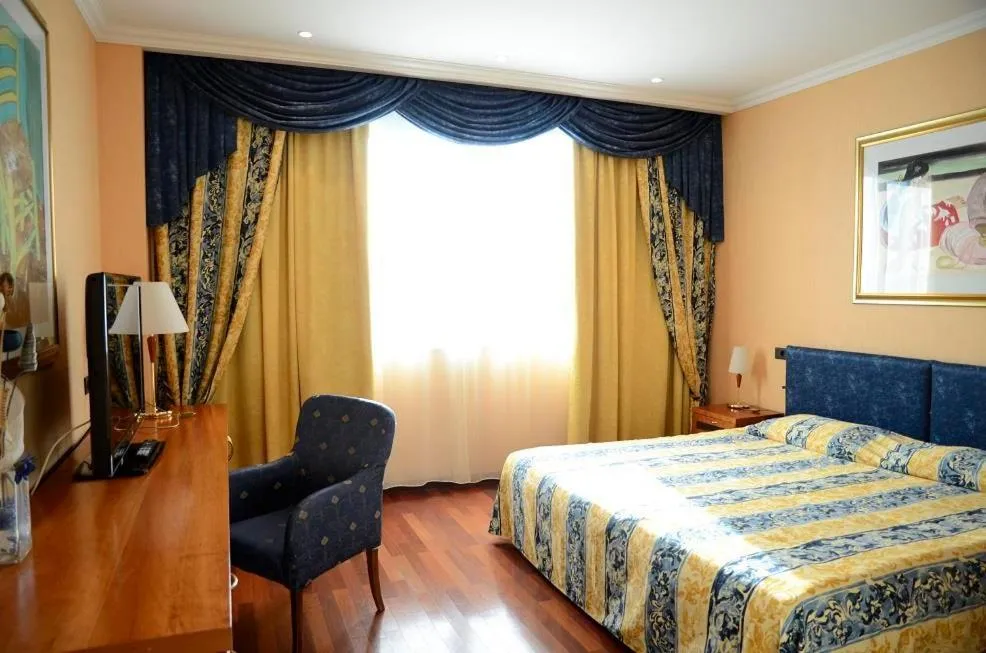 Bed in River Palace Hotel