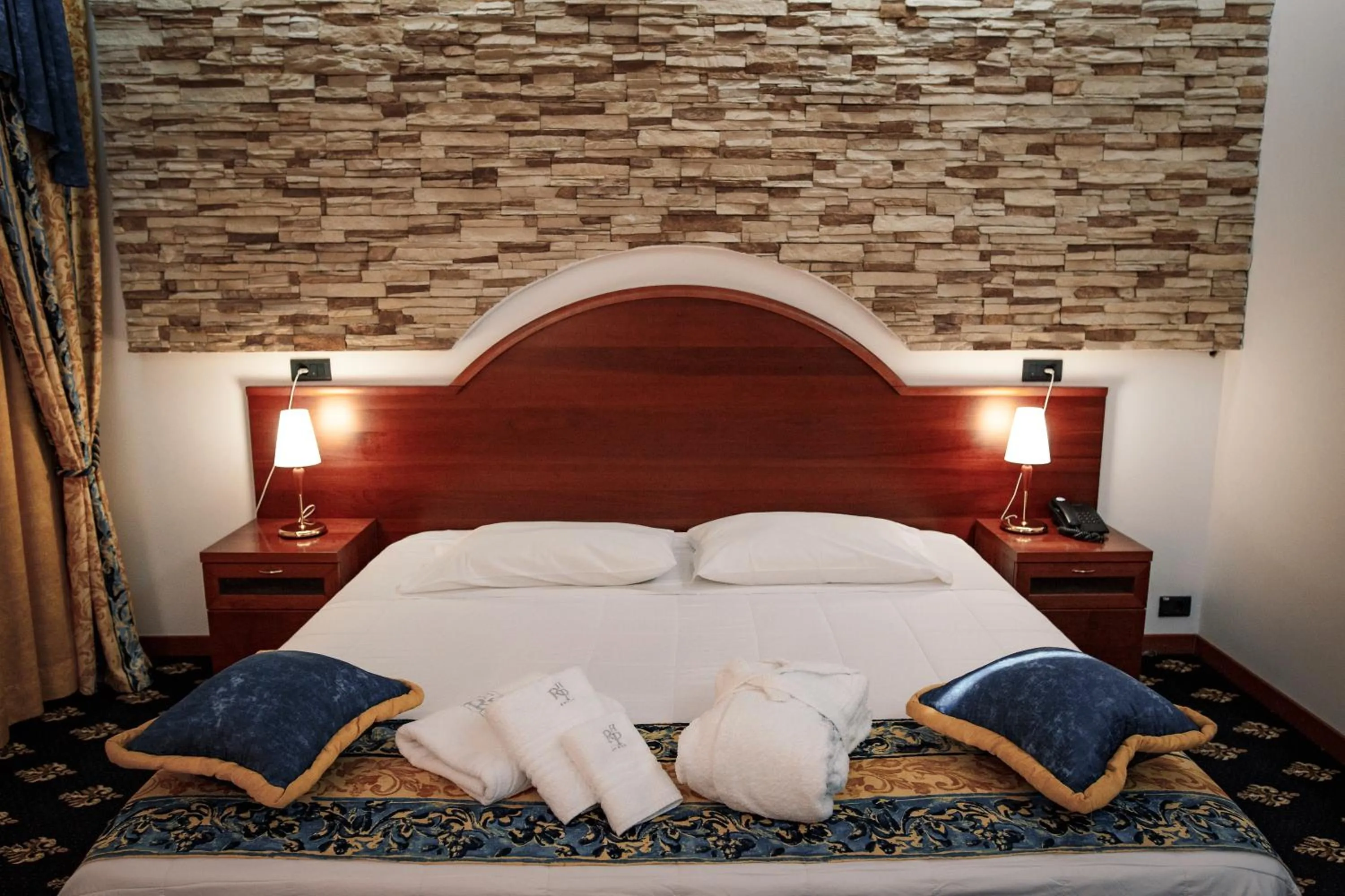 Bed in River Palace Hotel