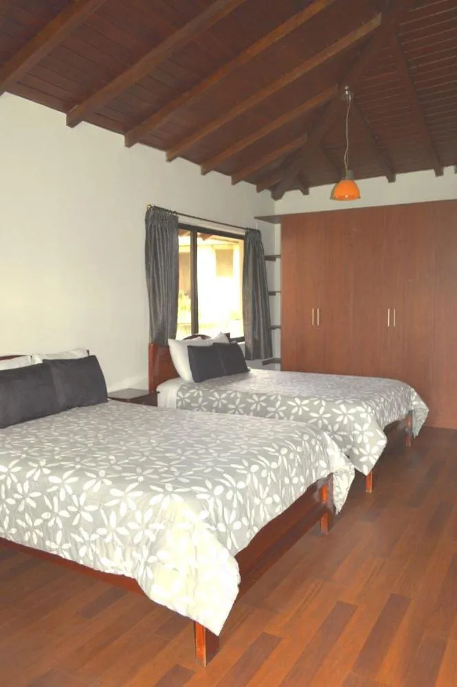 Bed in Quito Airport Suites Hotel