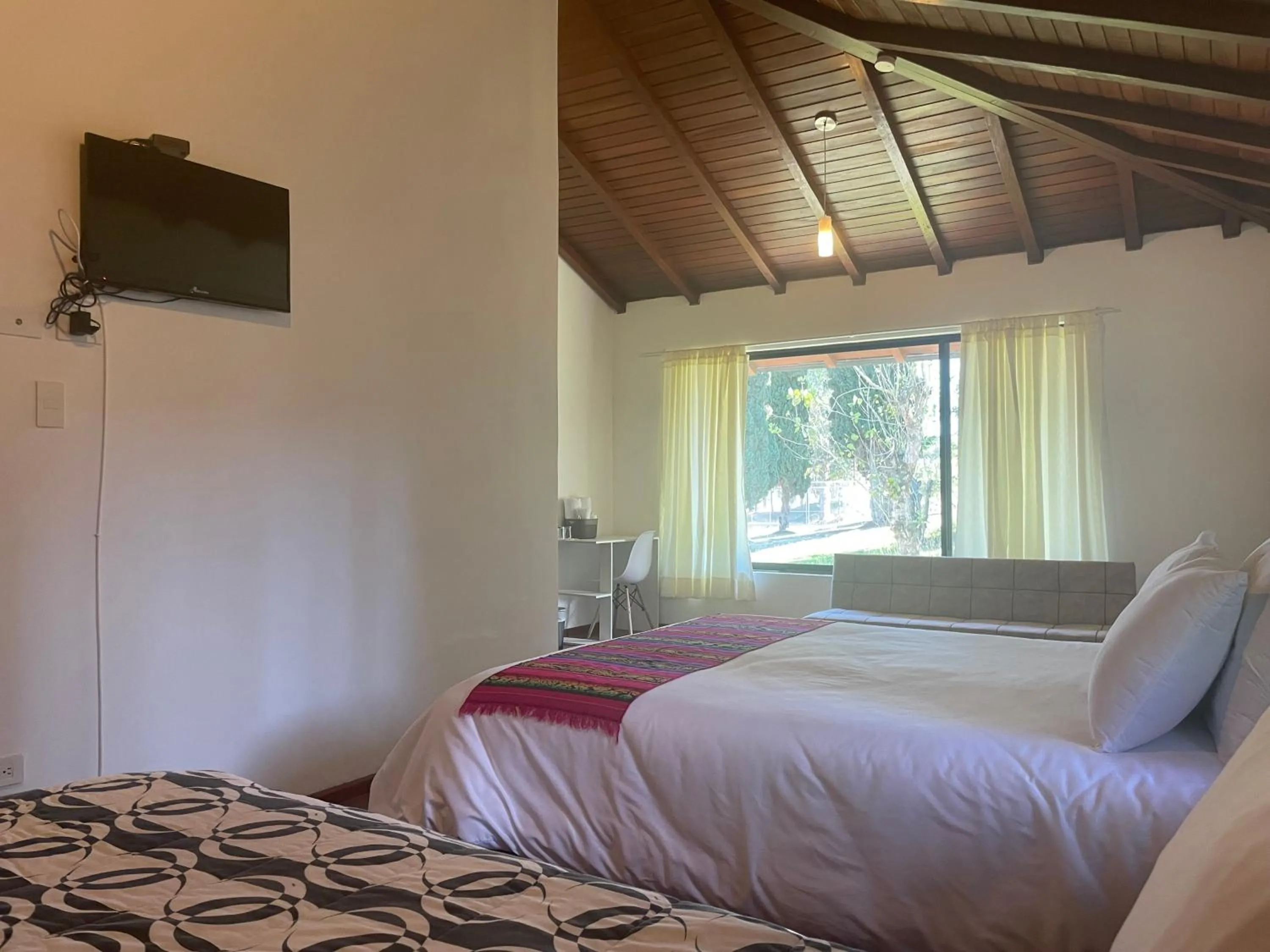 Bed in Quito Airport Suites Hotel