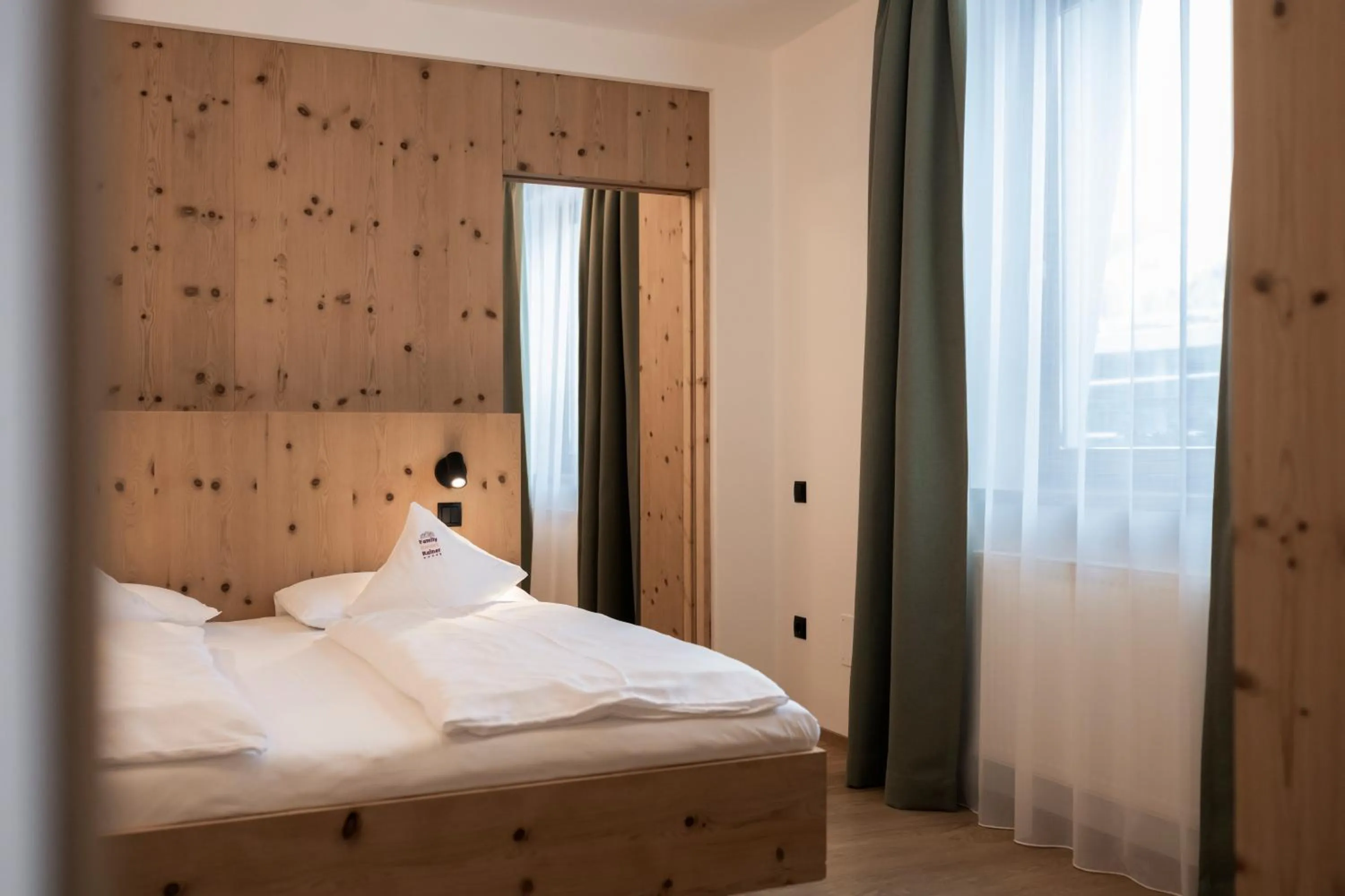 Bed in Family Resort Rainer Sexten