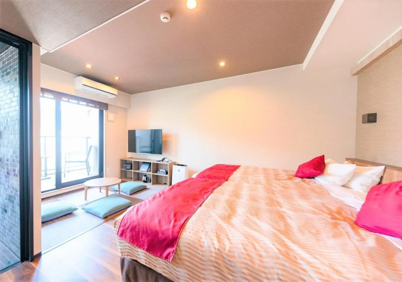 Bed in LiVEMAX RESORT Atami Sea Front