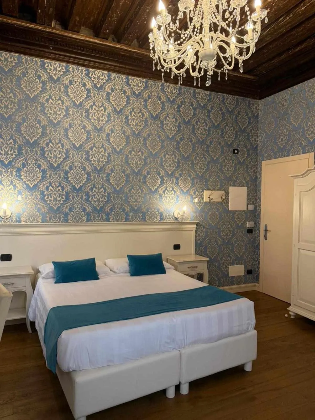 Bed in Charming Palace Santa Fosca