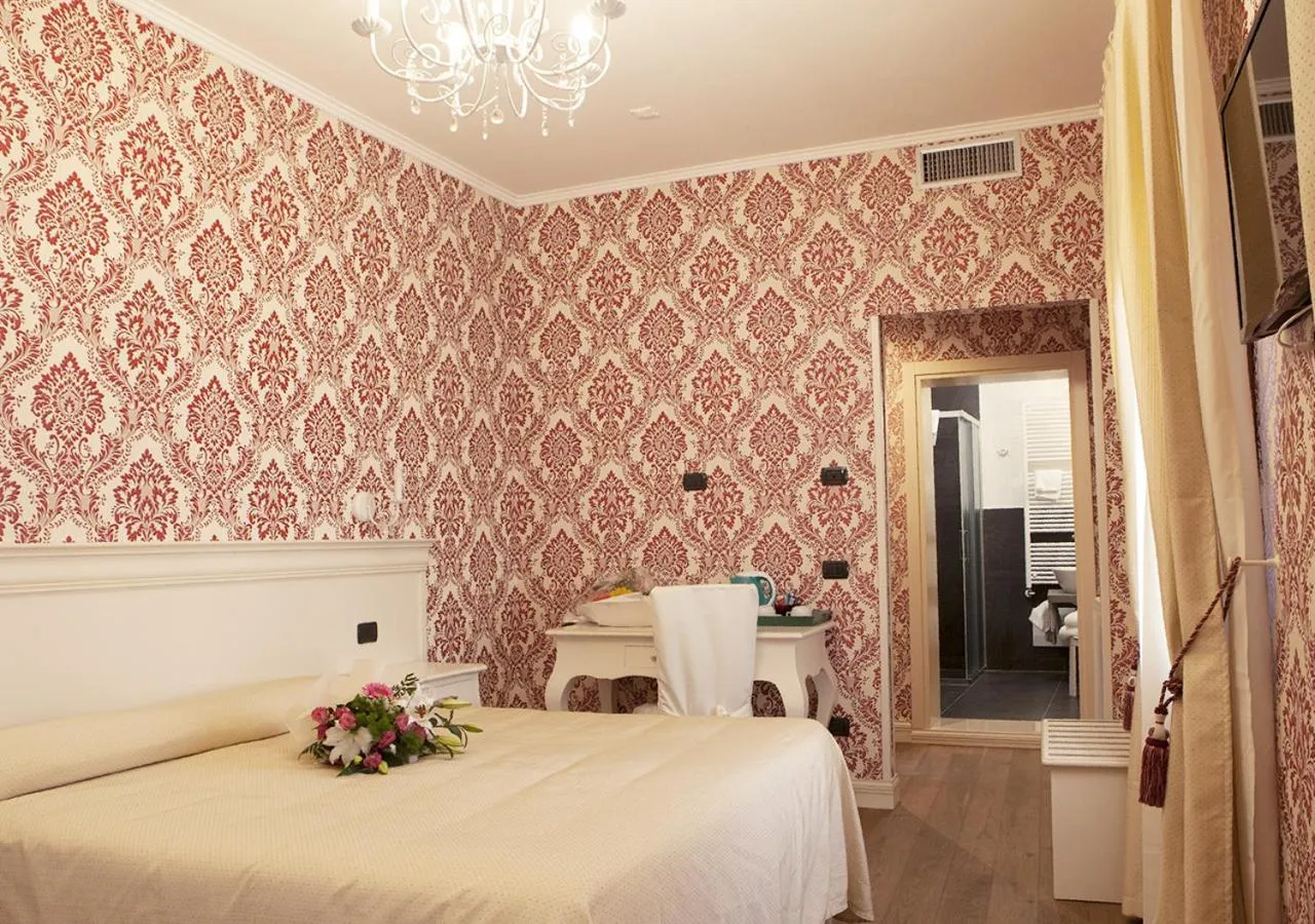 Bed in Charming Palace Santa Fosca