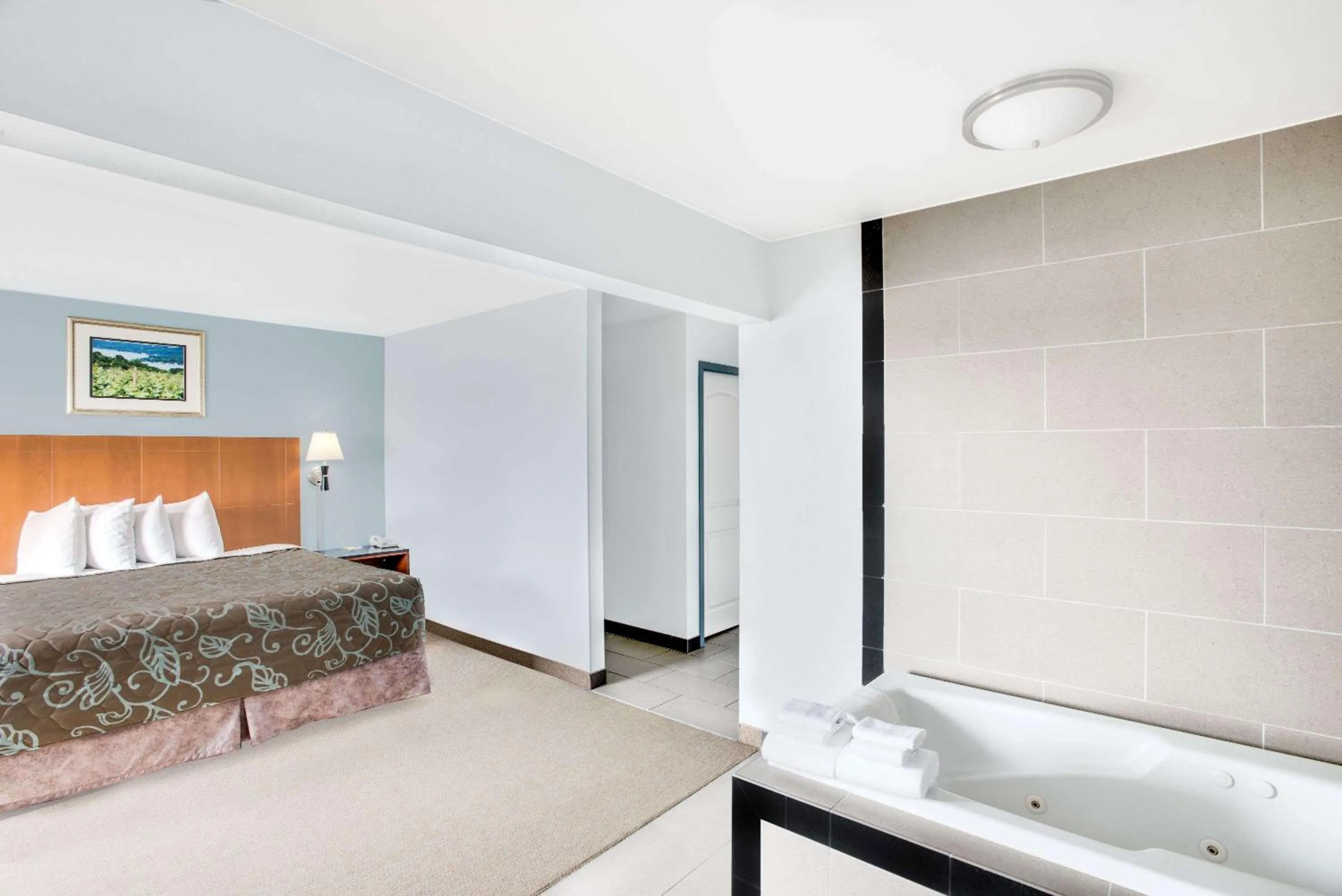 Photo of the whole room, Bed in Days Inn by Wyndham Watertown Fort Drum