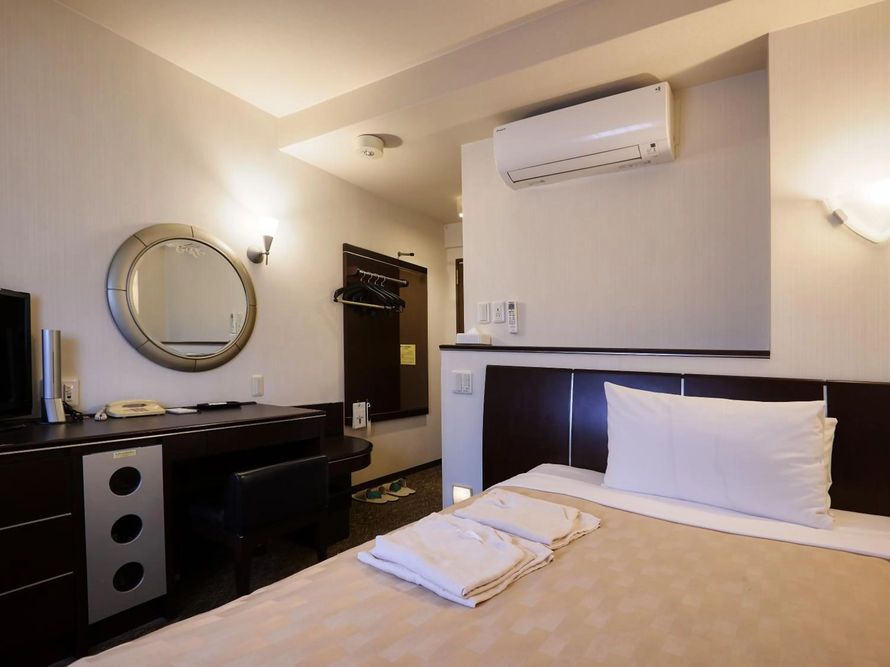 Photo of the whole room, Bed in GRG Hotel Naha