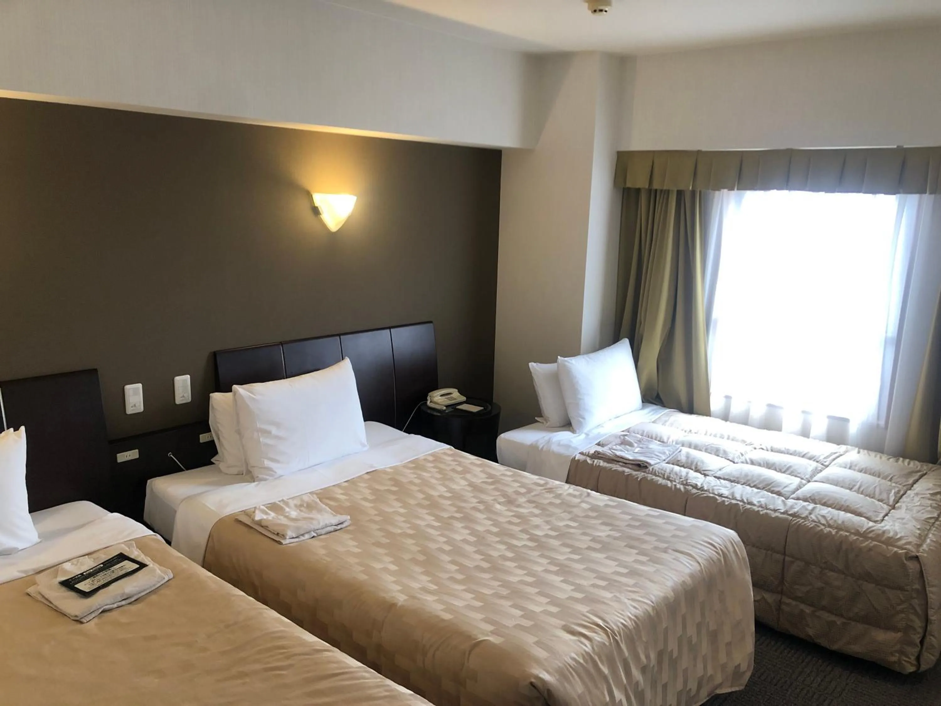 Photo of the whole room, Bed in GRG Hotel Naha