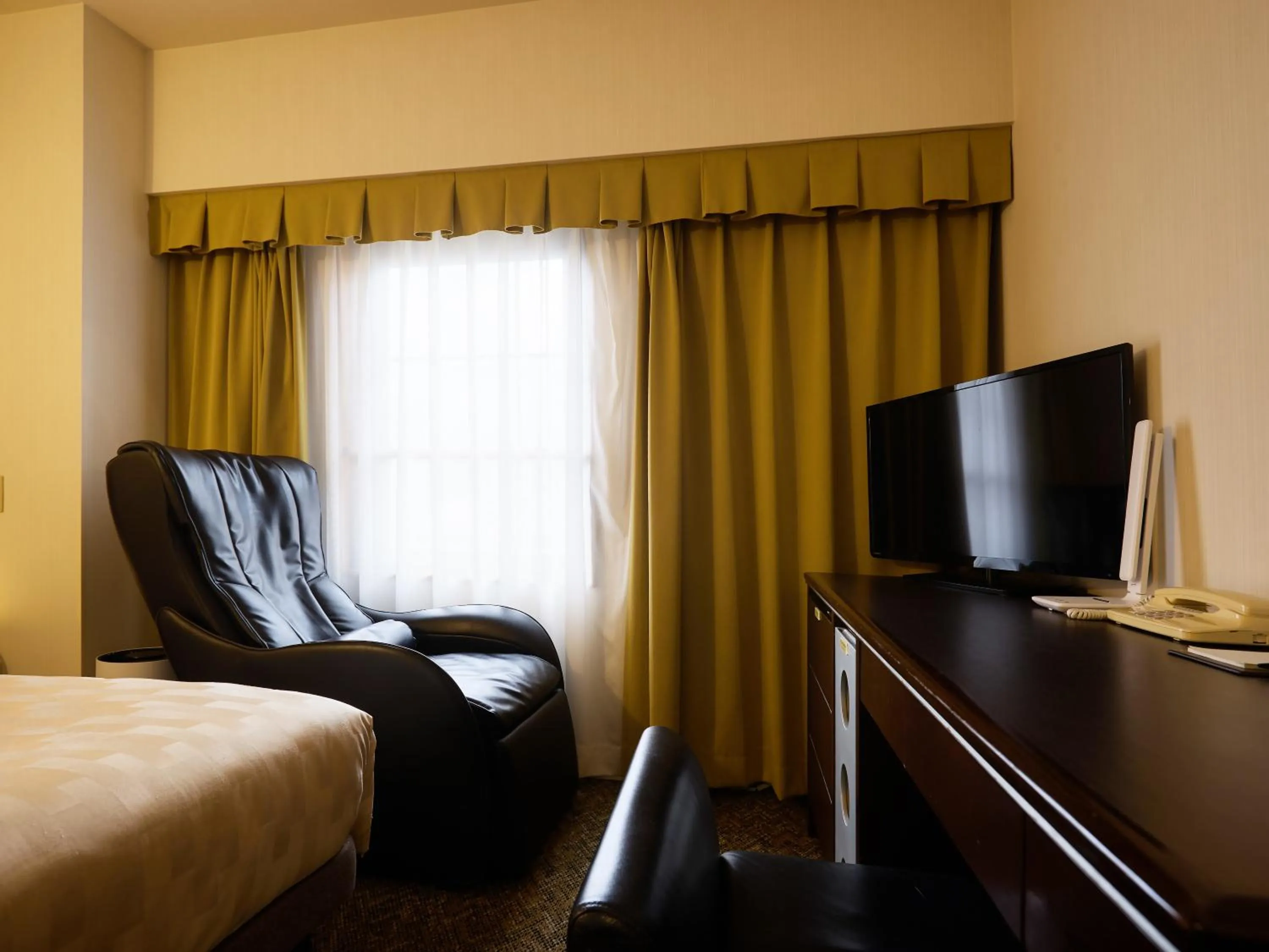Photo of the whole room, Bed in GRG Hotel Naha
