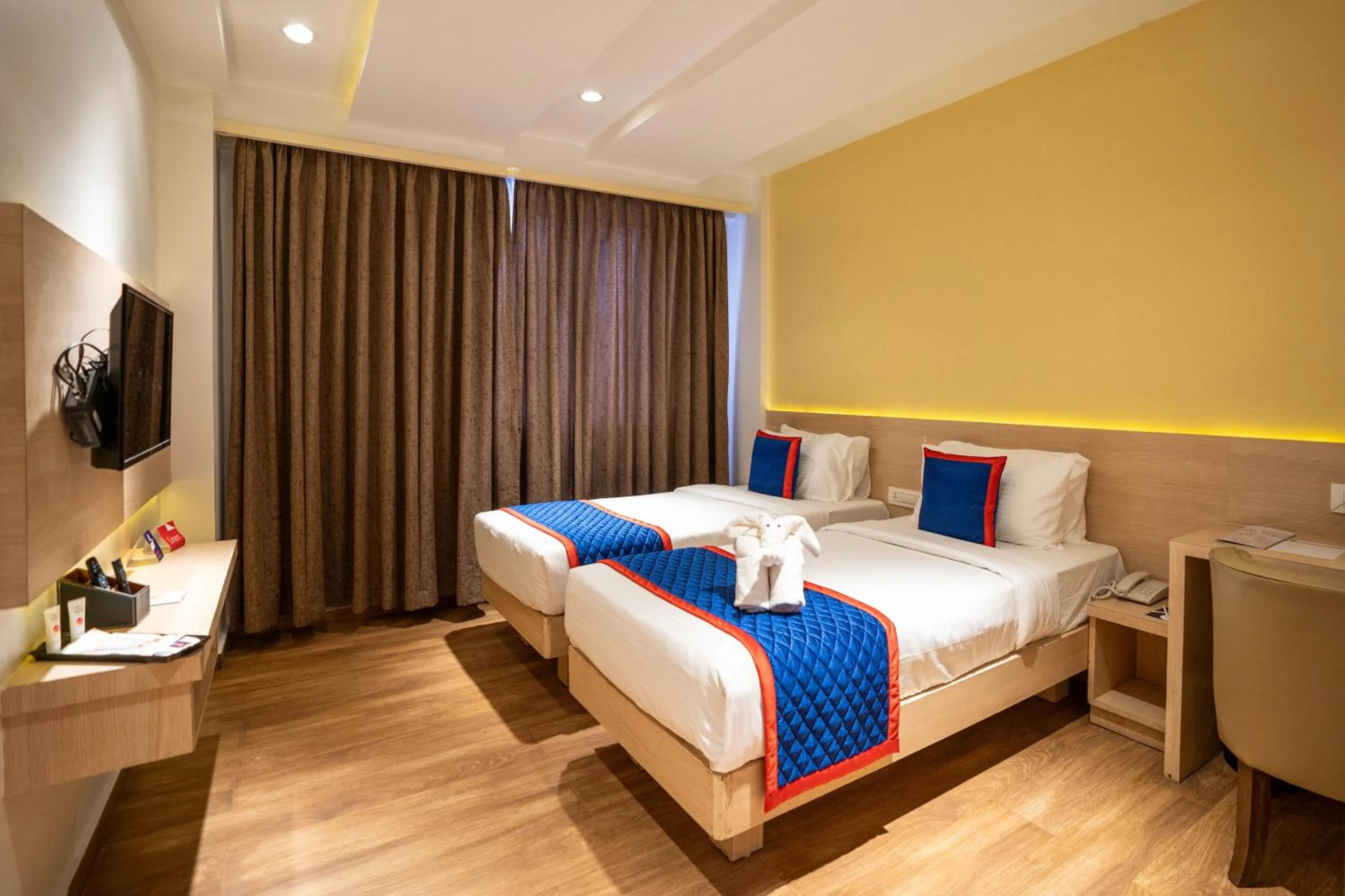 Bed in Zip By Spree Hotels Samudra Belgaum