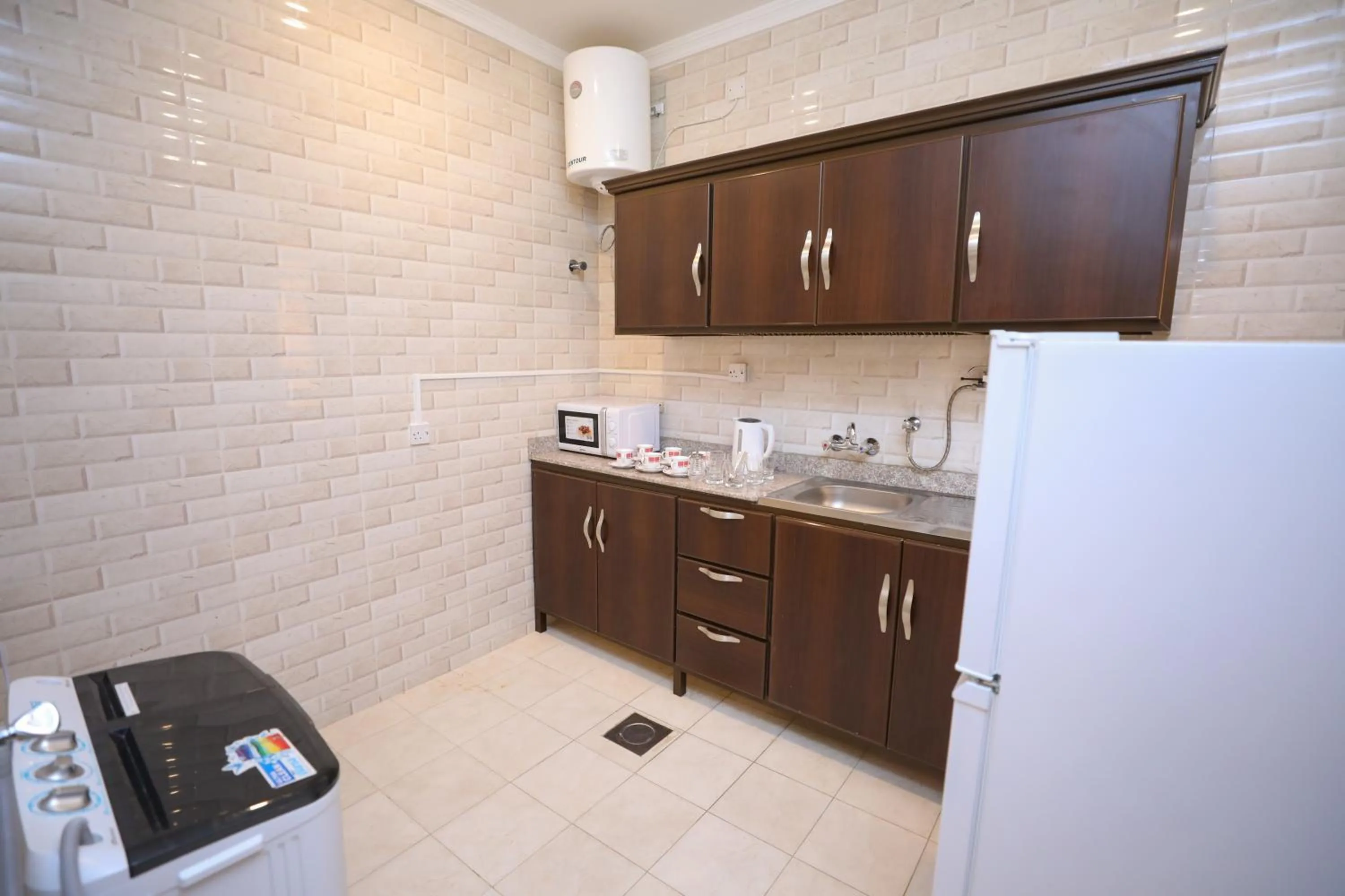 Kitchen or kitchenette, Kitchen/Kitchenette in Magic Suite Al Mahboula