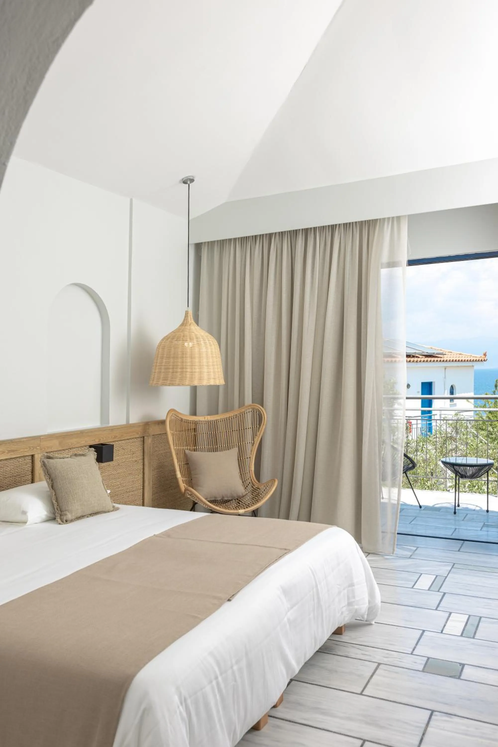 Bed in Sunrise Village Beach Hotel