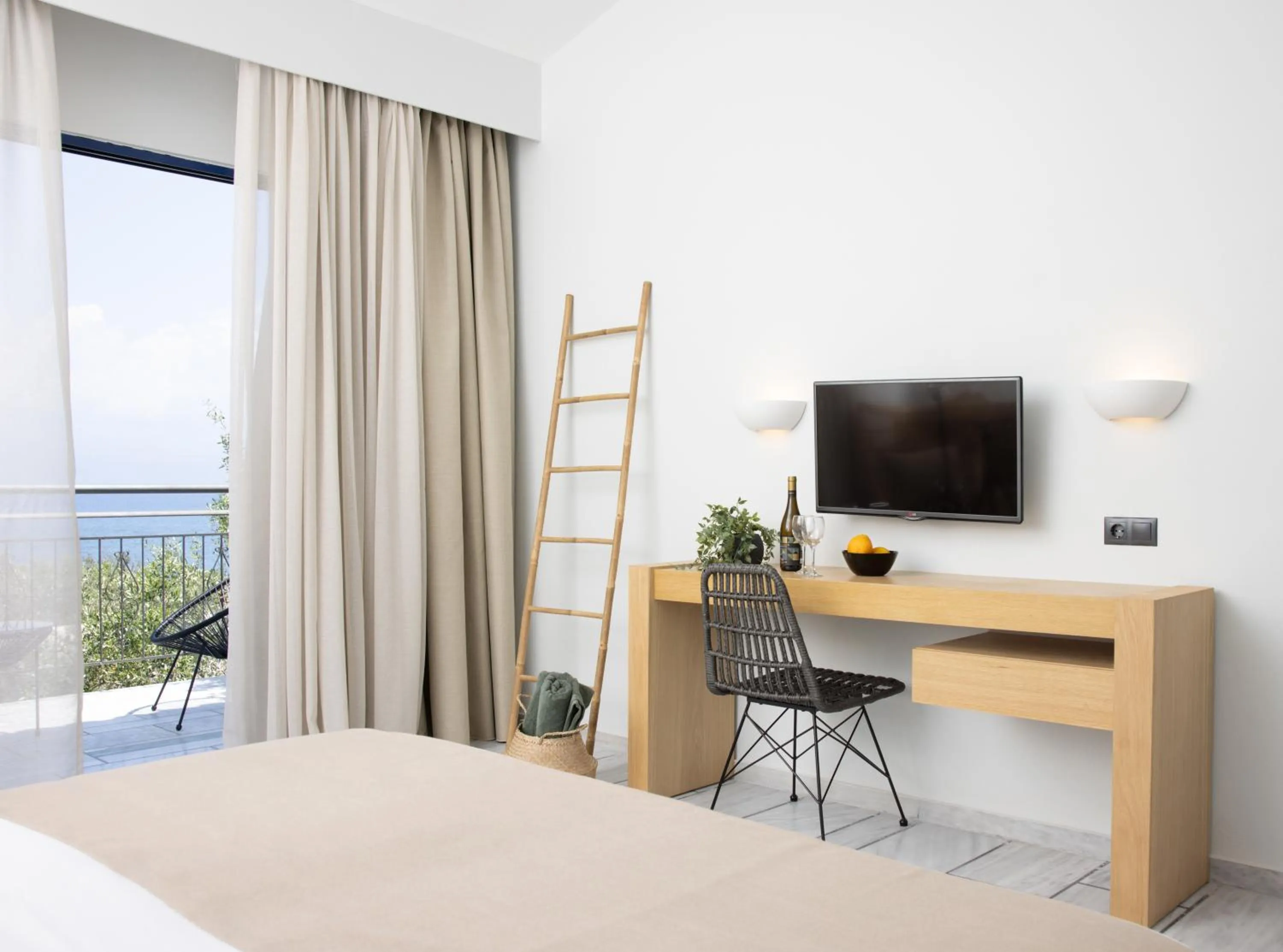 Bed in Sunrise Village Beach Hotel