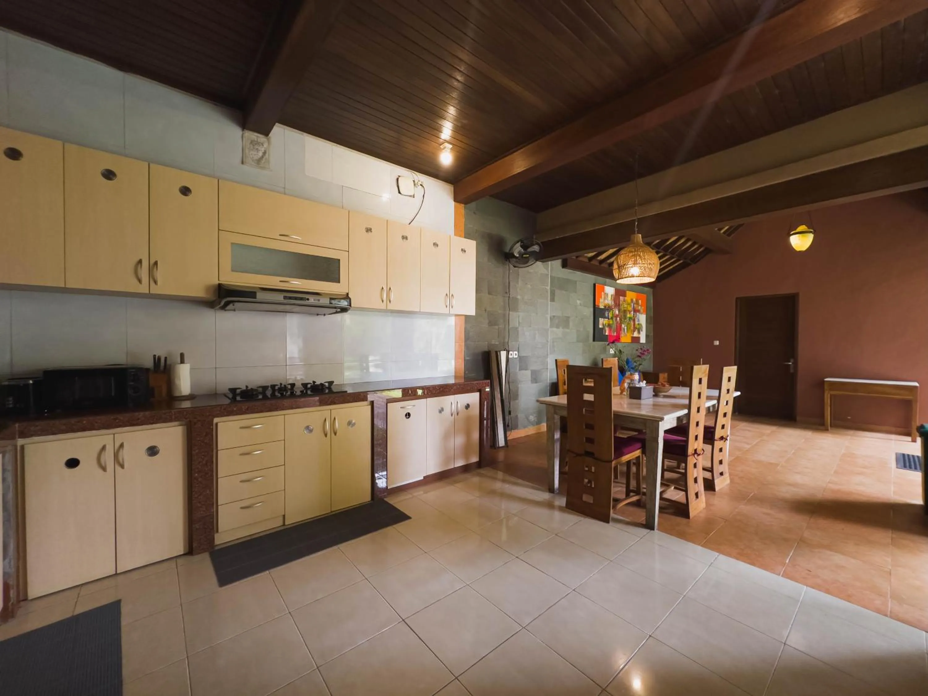 Kitchen or kitchenette in Pukakoo Villas and Suite by Supala