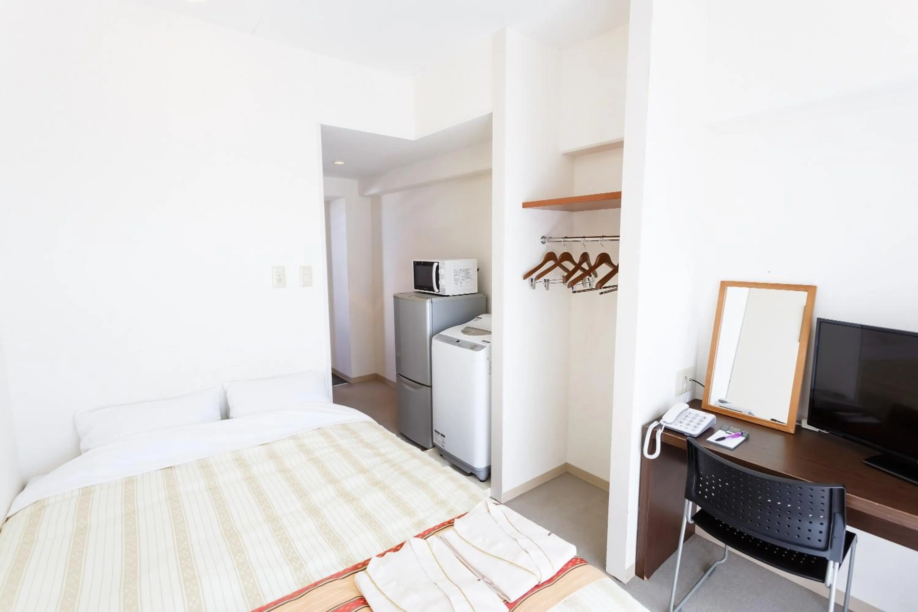 Photo of the whole room, Bed in Hotel Peace Island Ishigaki in Yashima