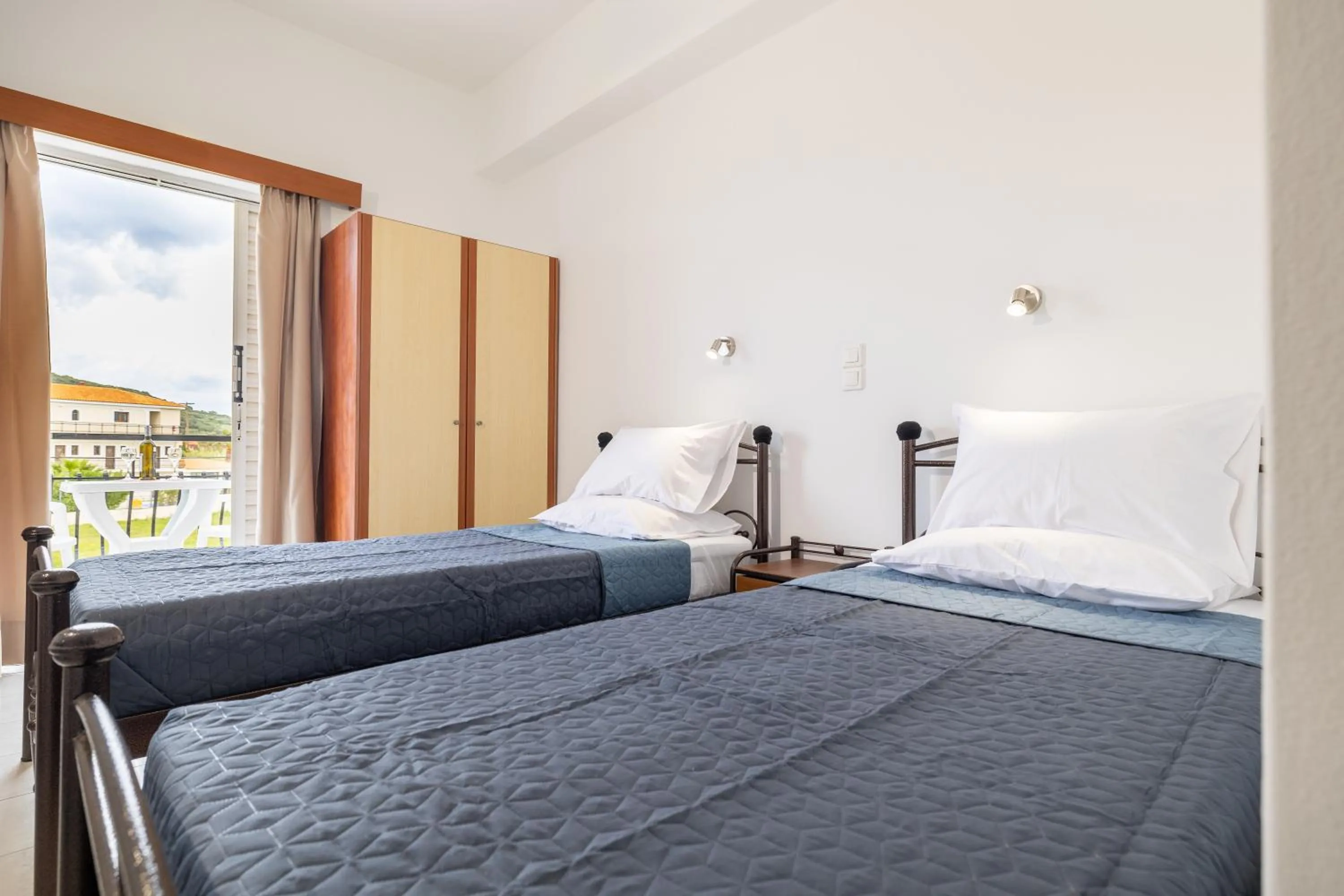 Bed in Valianos Studios - Apartments