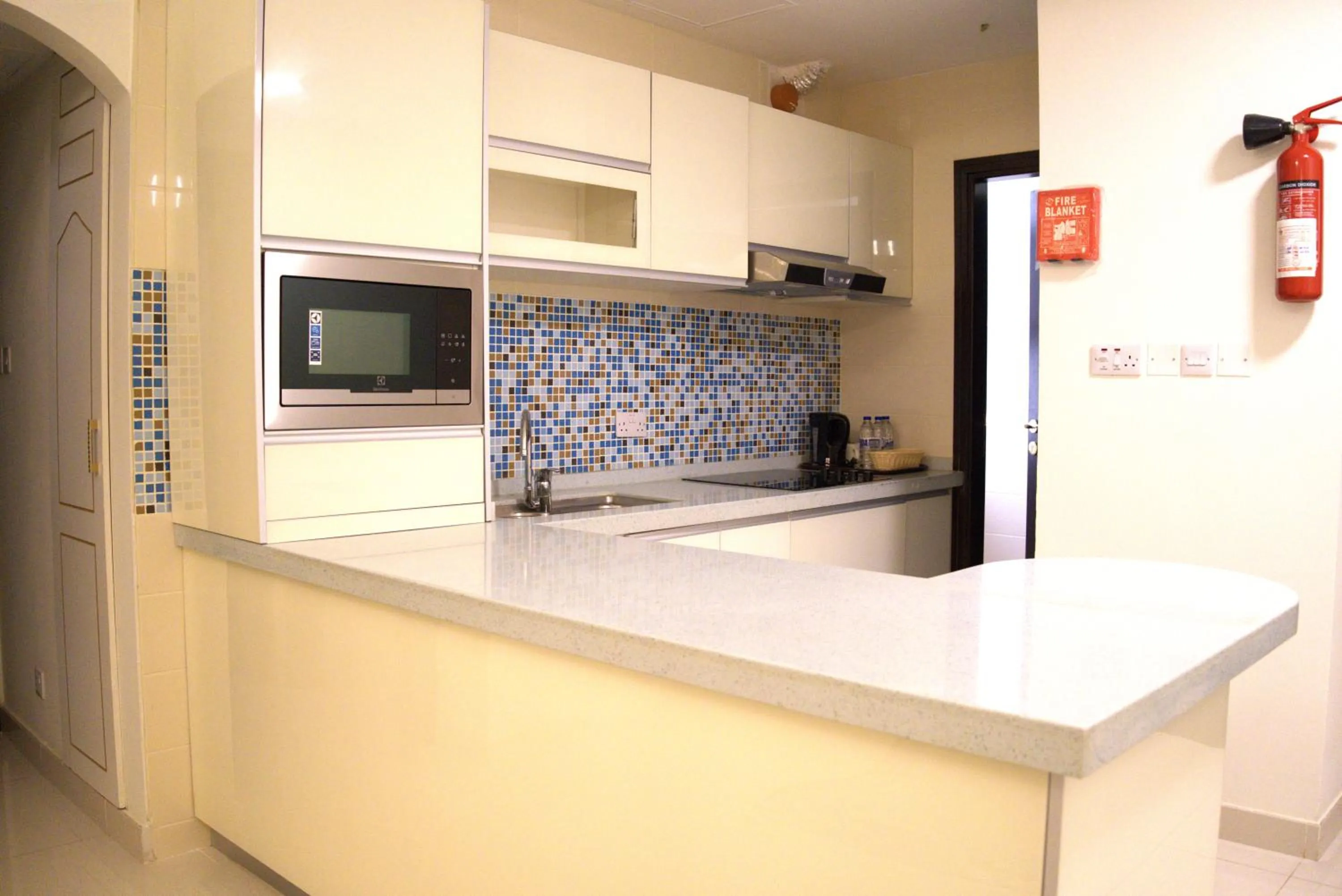 Kitchen or kitchenette in A'Sinamar Hotel Apartment