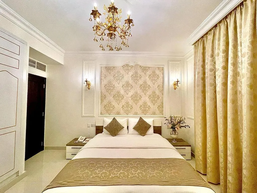 Bed in A'Sinamar Hotel Apartment