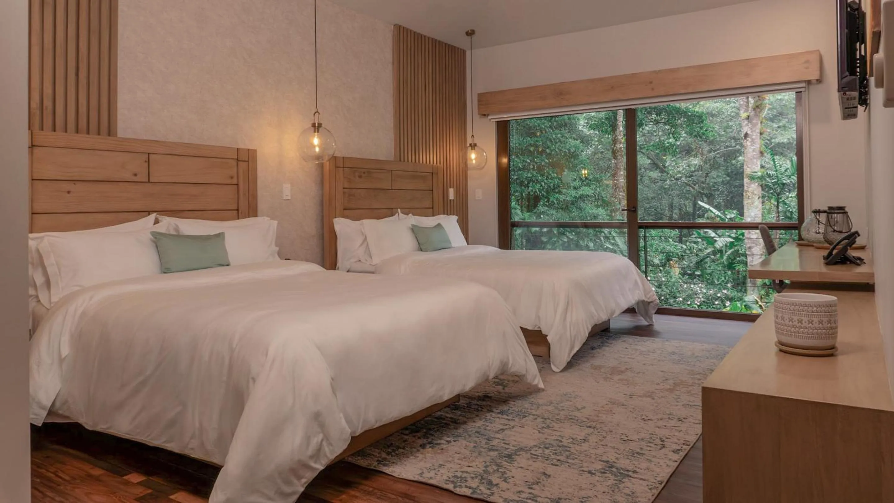 Bed in El Silencio Lodge & Spa Costa Rica