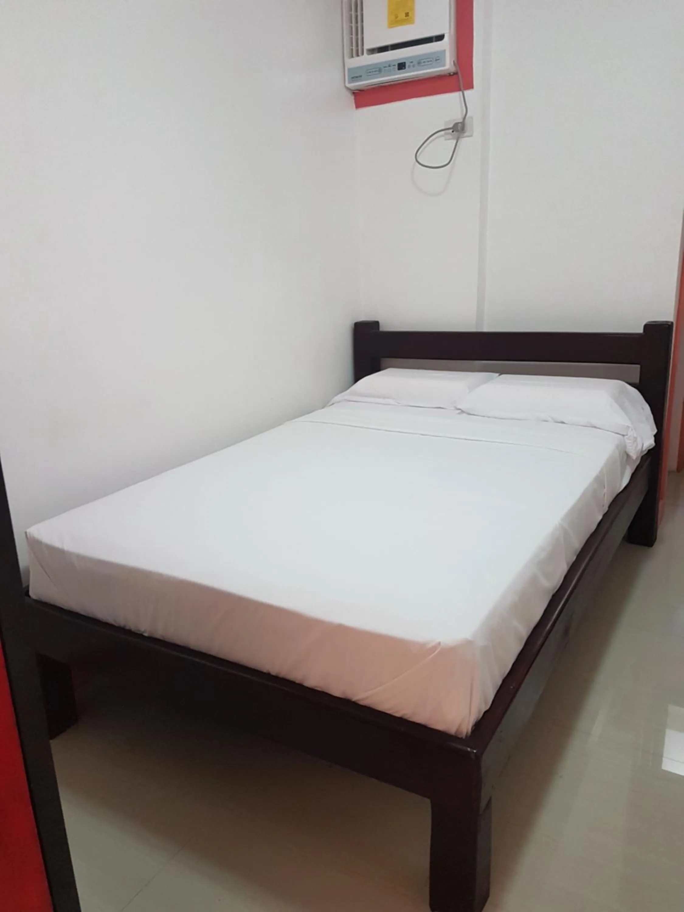 Bed in Catalina`s Inn family room