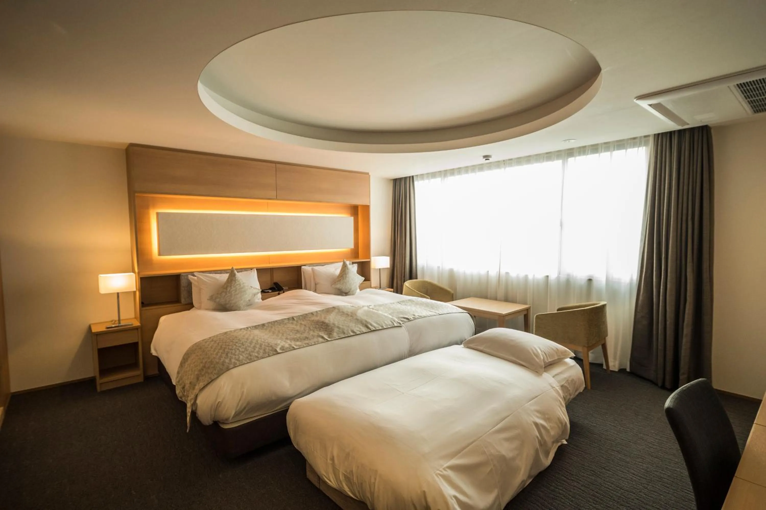 Bed in Kyoto Shijo Takakura Hotel Grandereverie