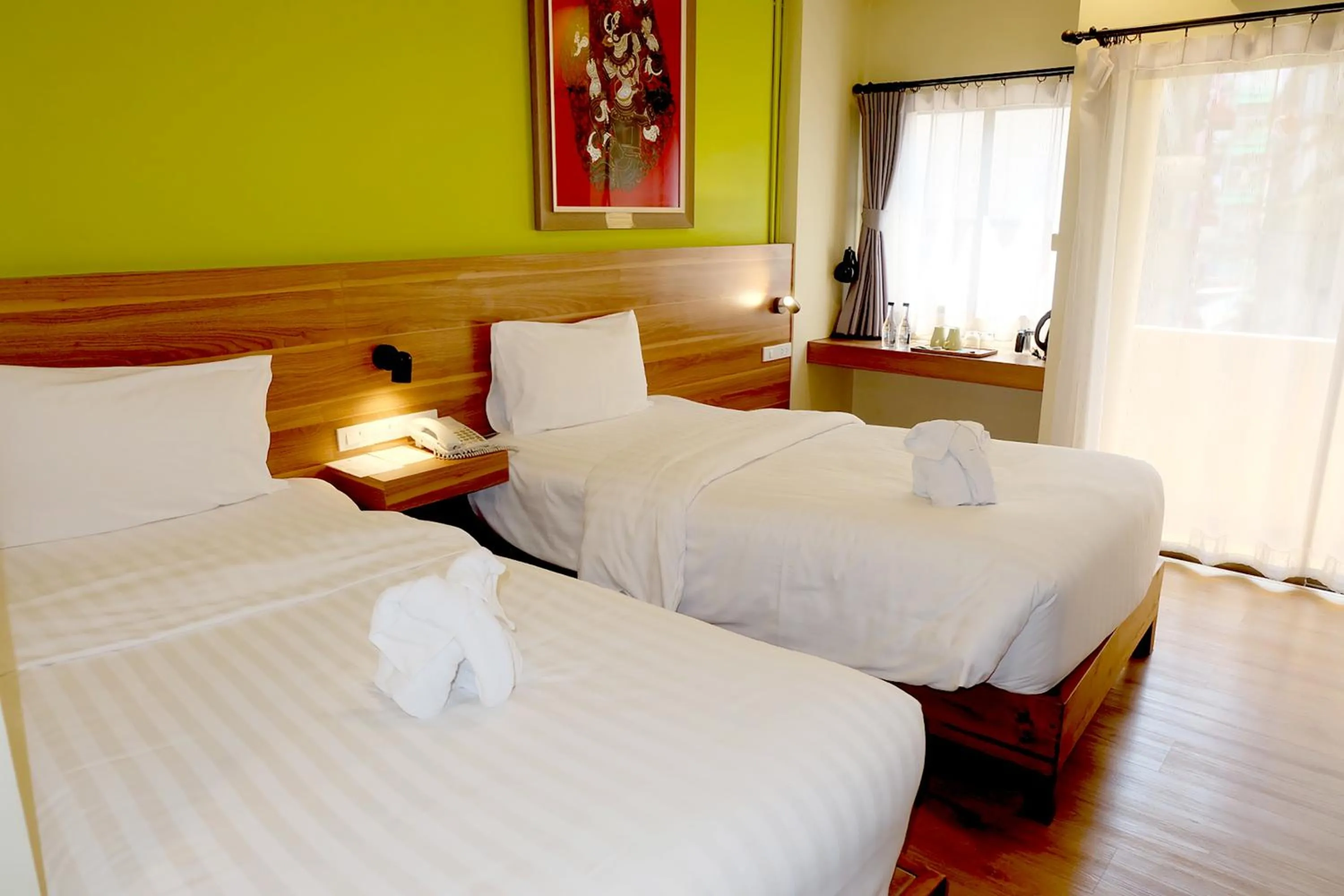 Photo of the whole room, Bed in Siri Oriental Bangkok Hotel