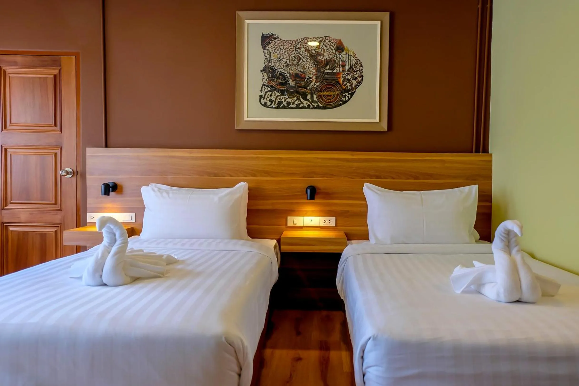 Bed in Siri Oriental Bangkok Hotel