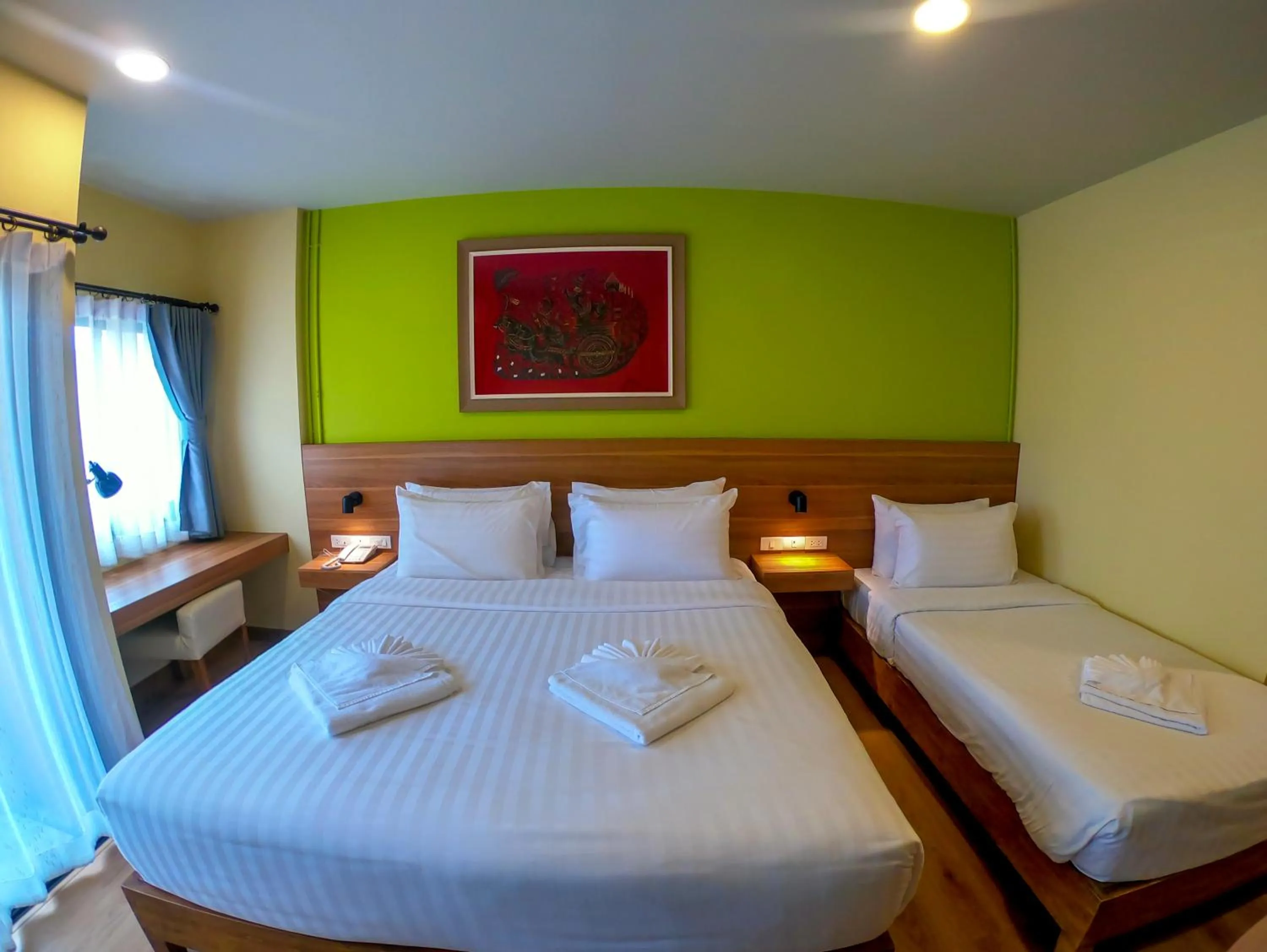 Bed in Siri Oriental Bangkok Hotel