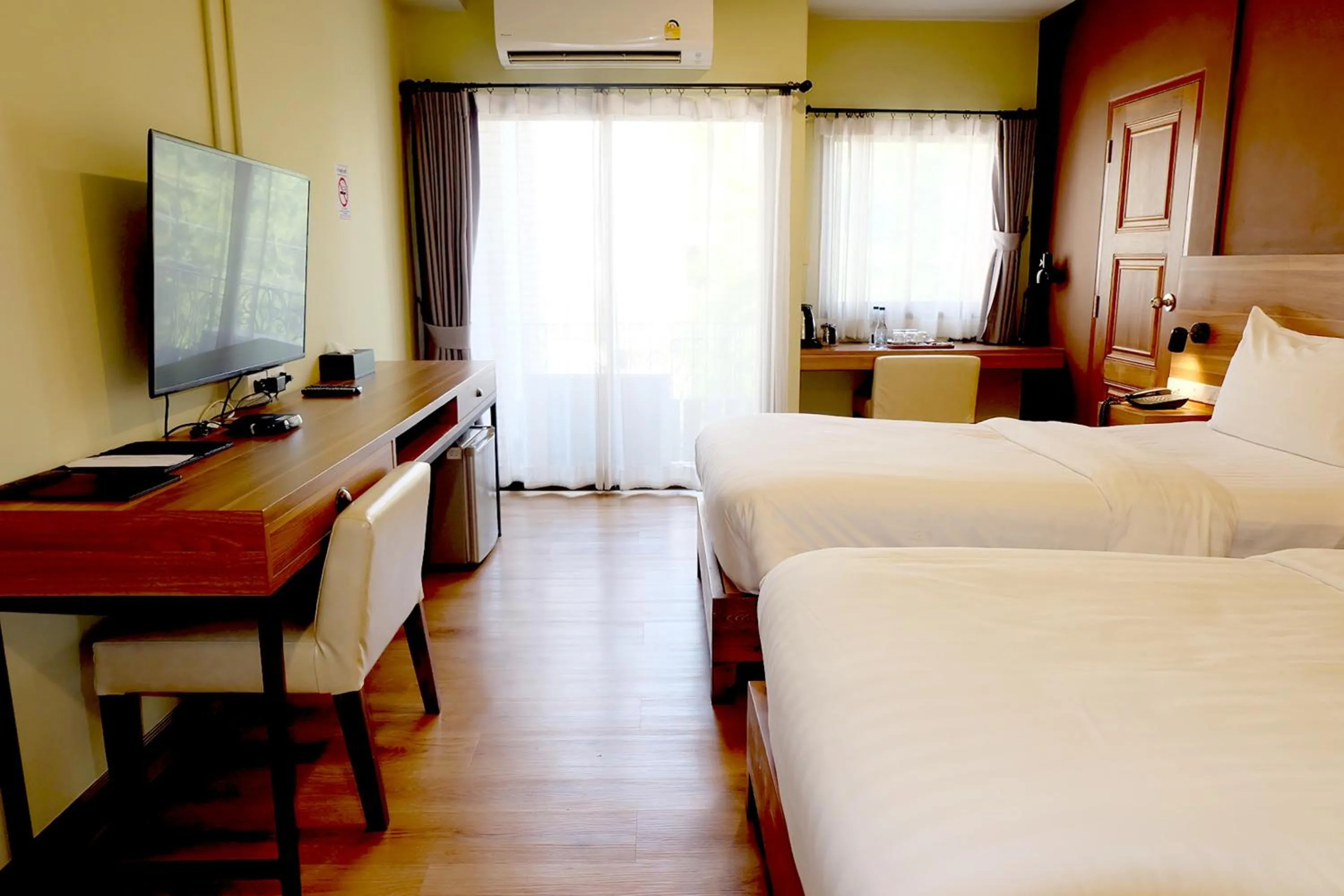 Bed in Siri Oriental Bangkok Hotel