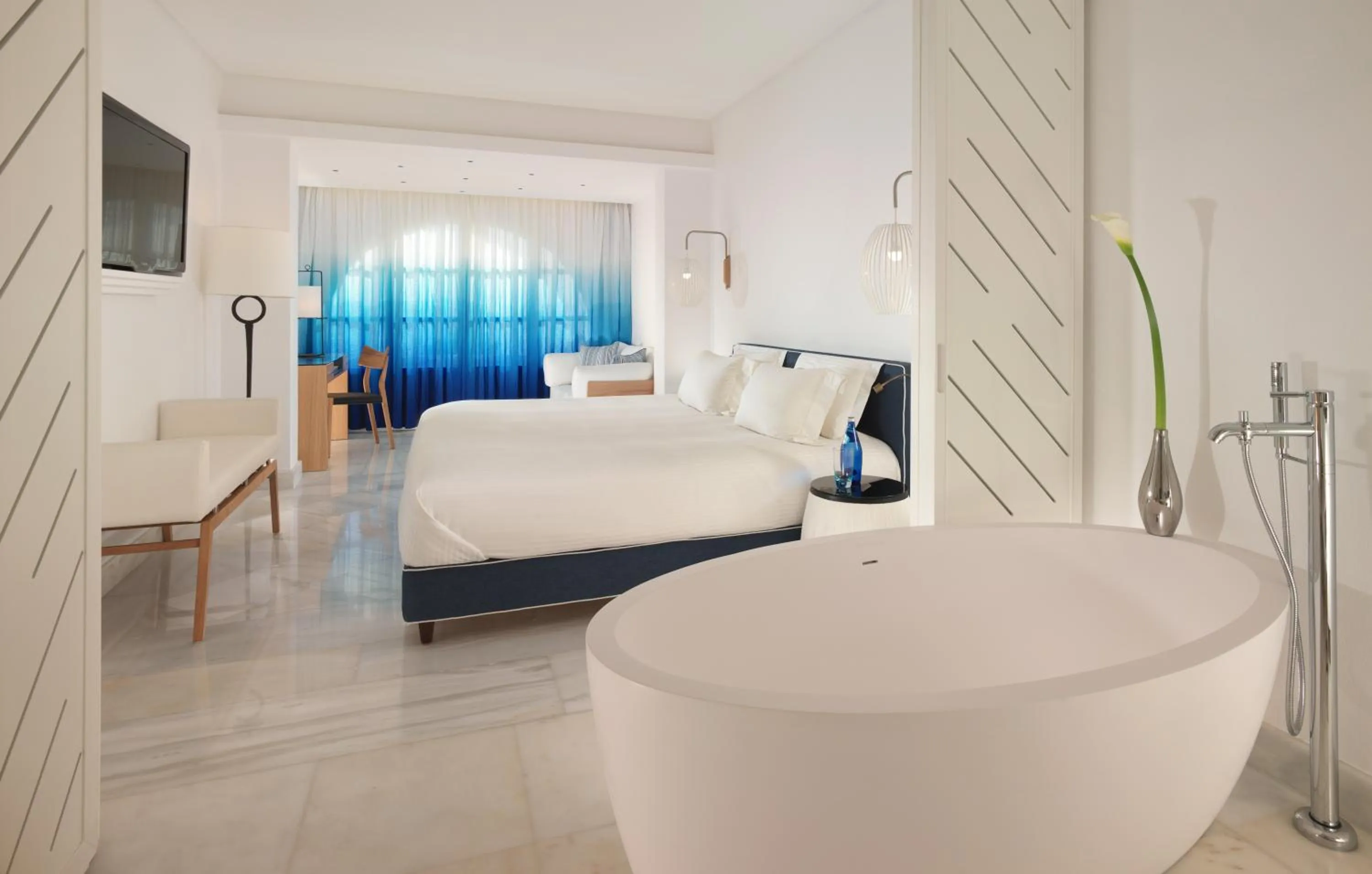 Photo of the whole room, Bed in Mykonos Grand Hotel & Resort