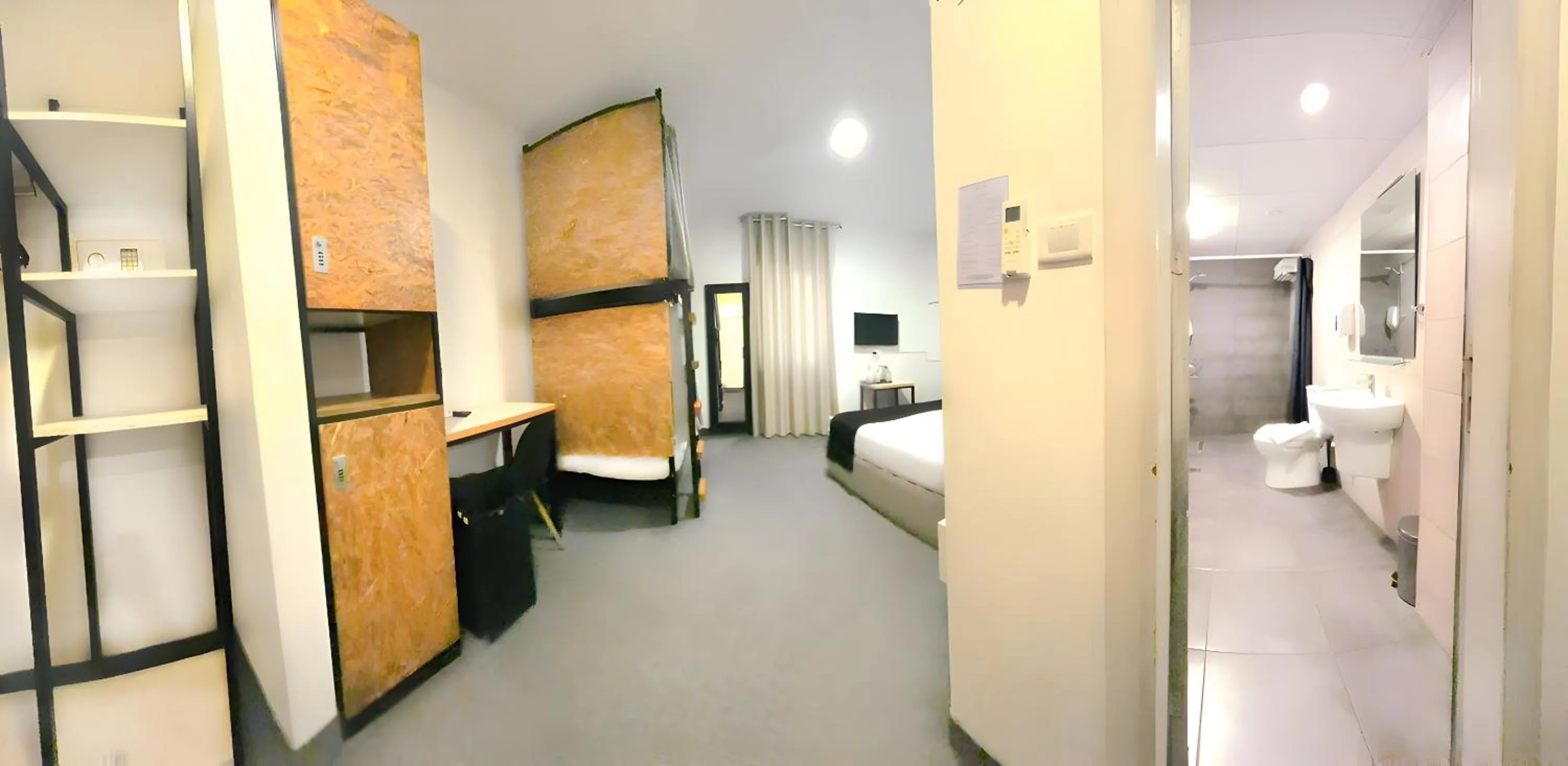 Toilet, Bed in Nomads Hotel