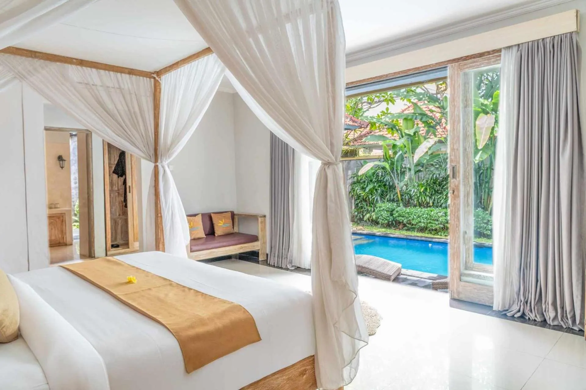 Bed in Freddies Resort & Villas Ubud by Kanaya Hospitality