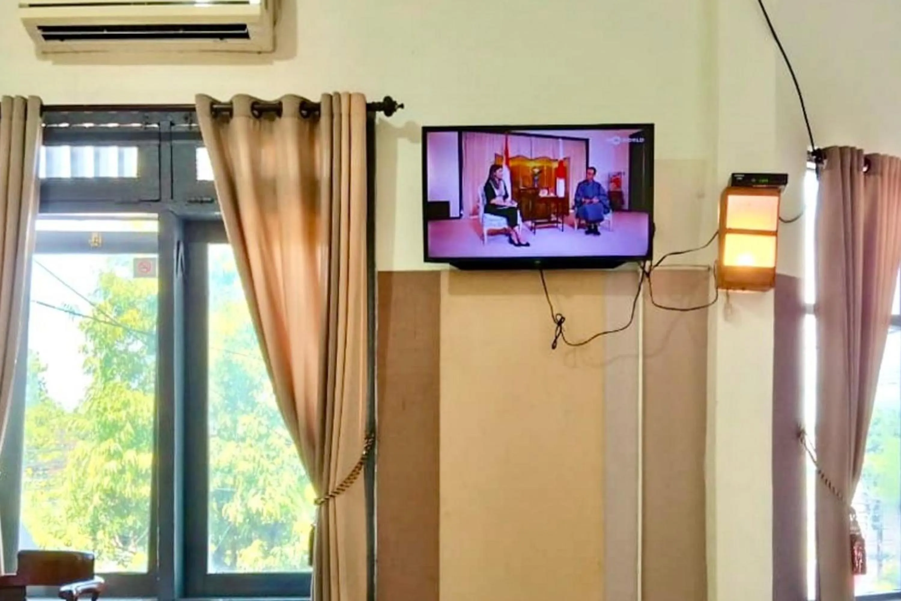 TV and multimedia in Hotel Bintang Mitra RedDoorz