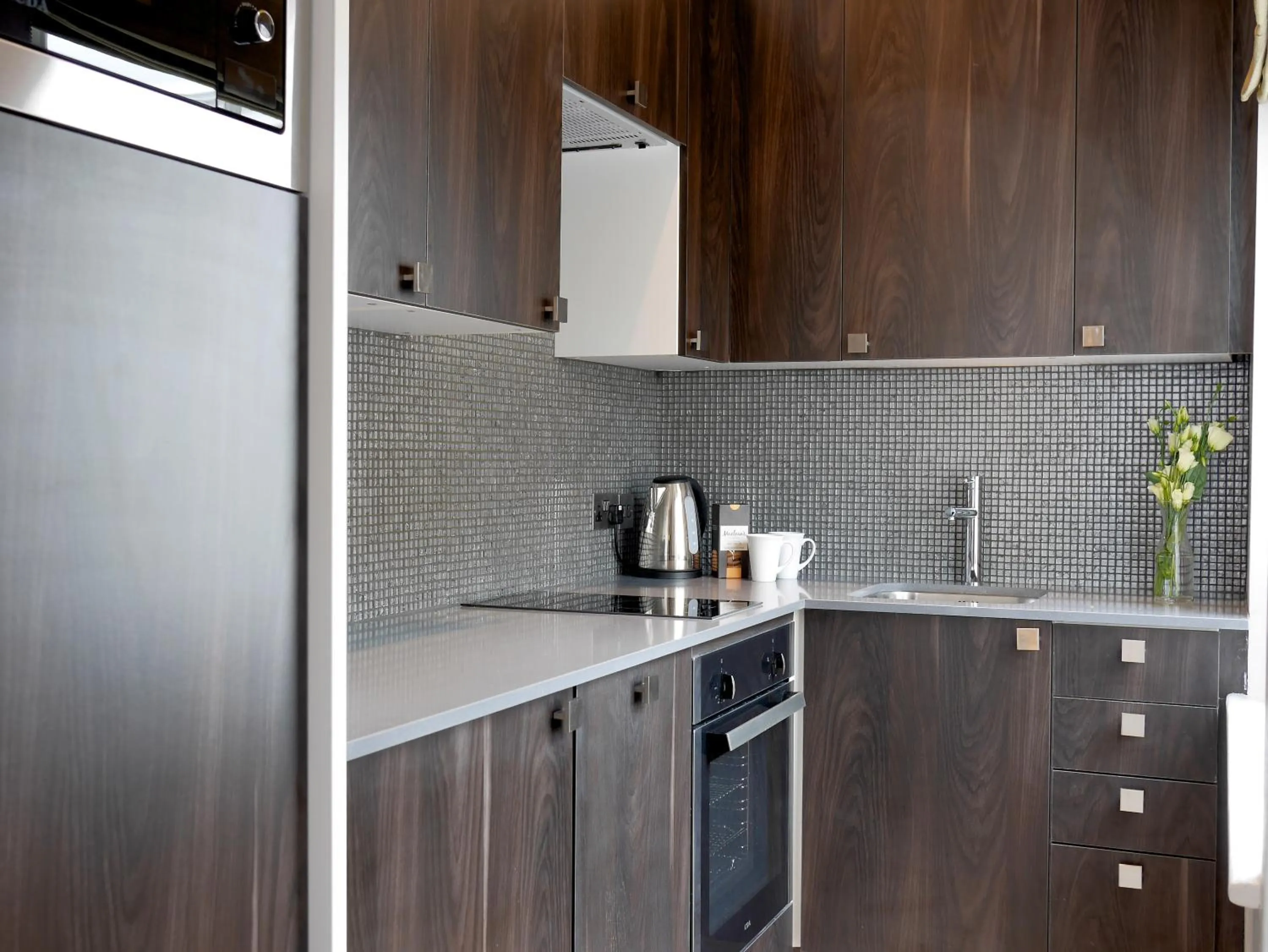 Kitchen or kitchenette in Nevern Place by Supercity Aparthotels