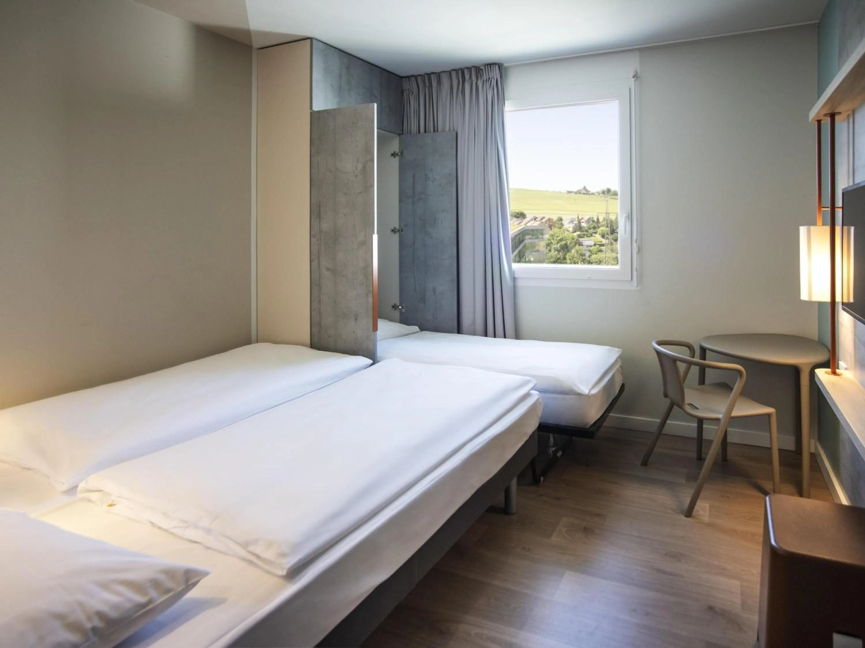 Bedroom, Bed in ibis budget Fribourg