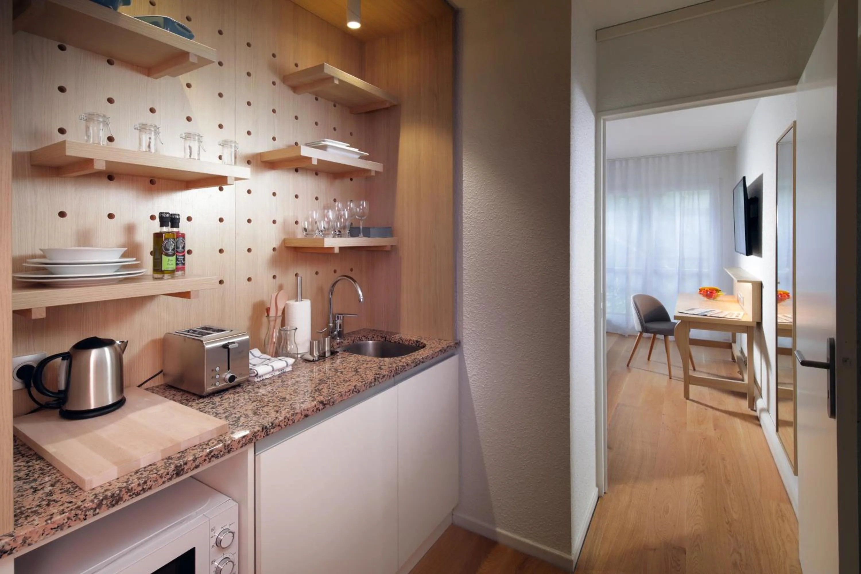 Kitchen or kitchenette in The Residence Hotel Geneva Airport - M3 Ferney