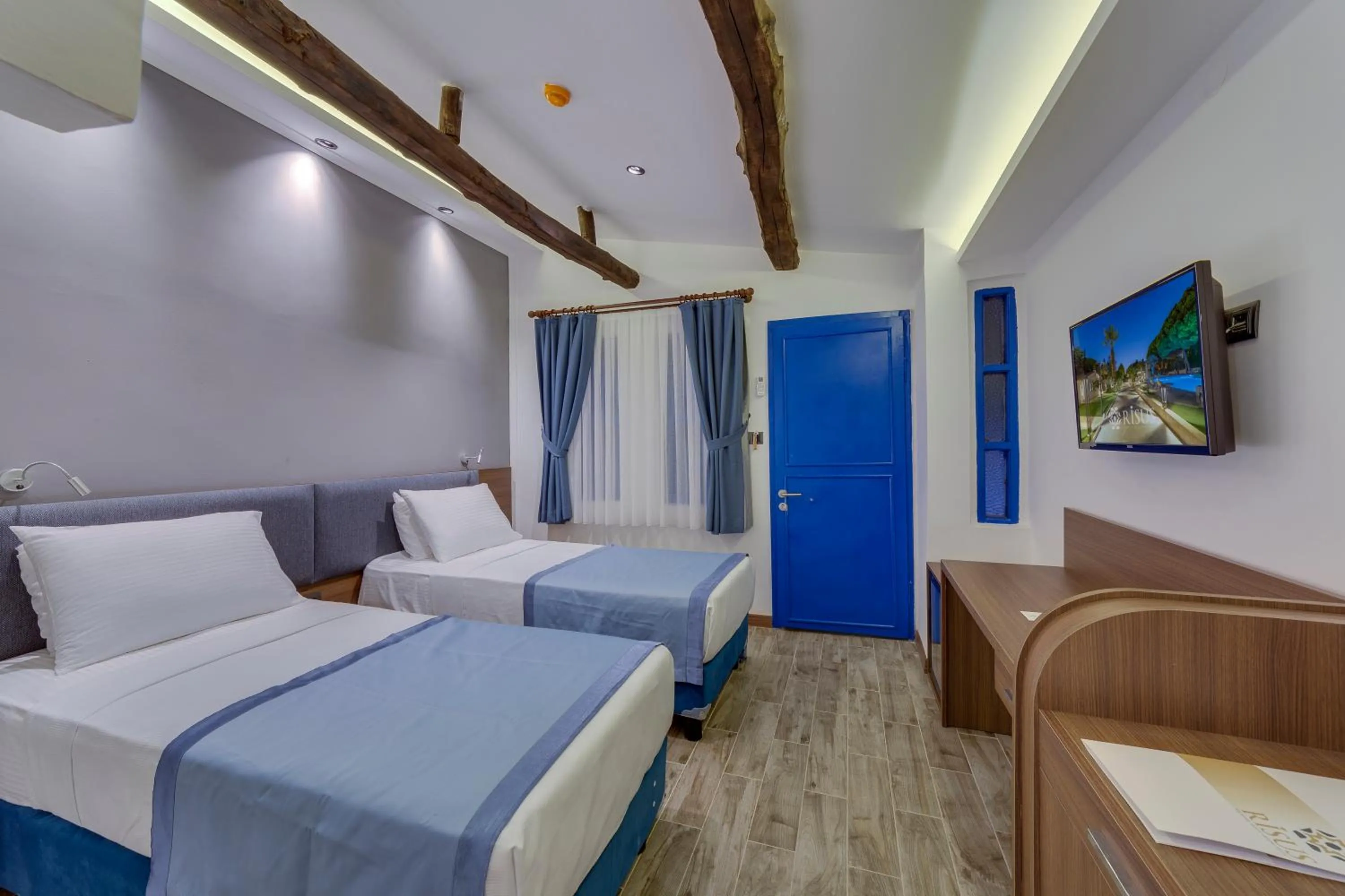 Photo of the whole room, Bed in Risus Garden Marina Hotel