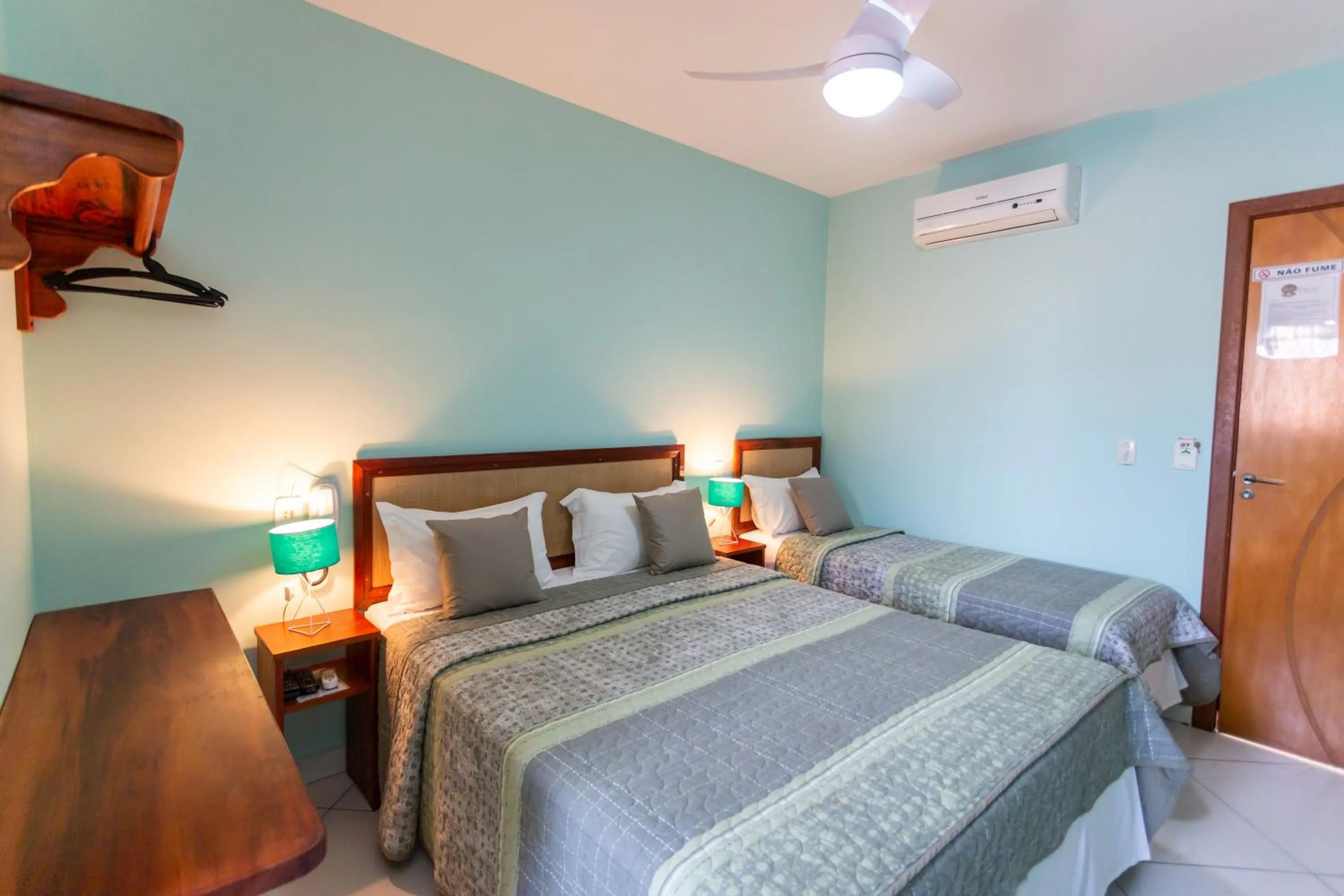 Bed in Pousada Pérola de Ubatuba