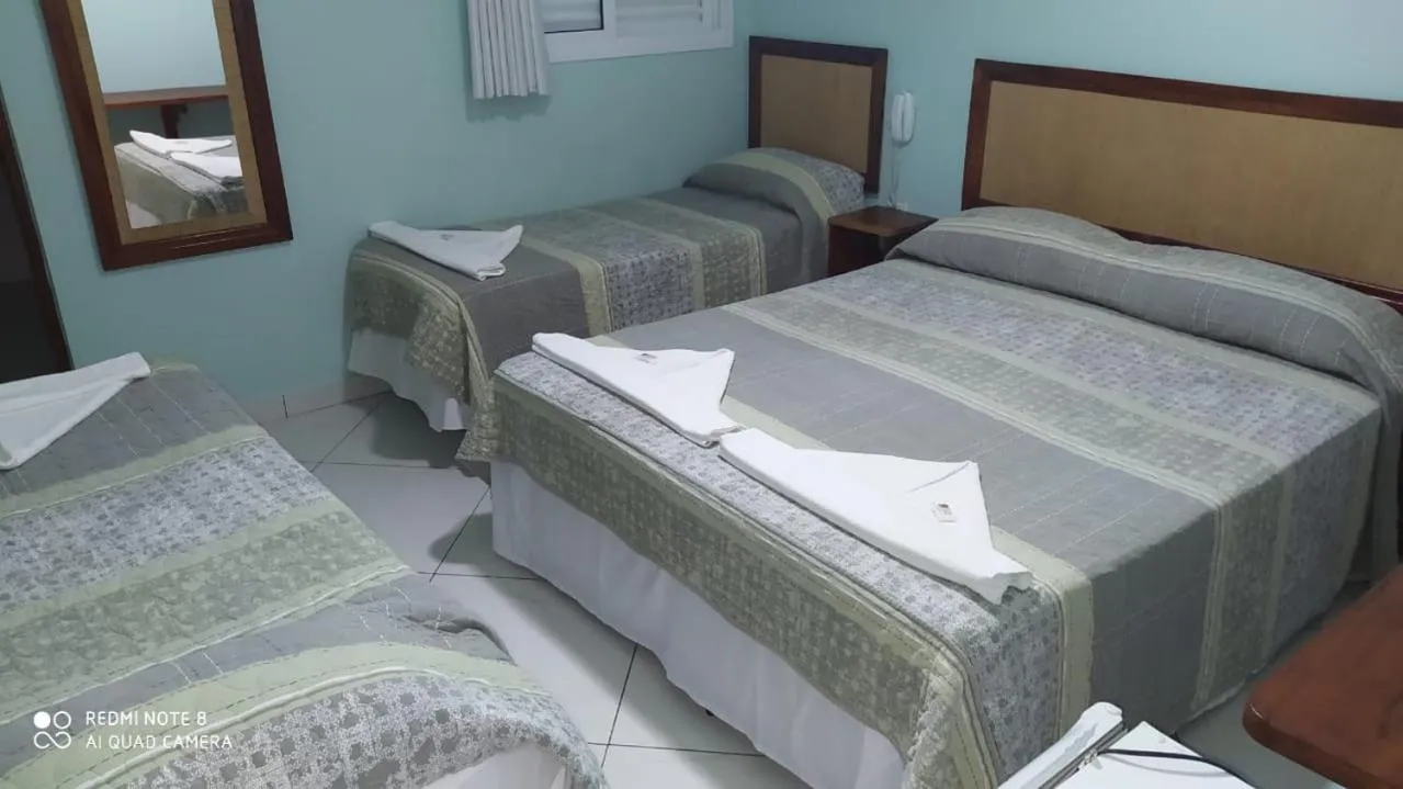 Bed in Pousada Pérola de Ubatuba