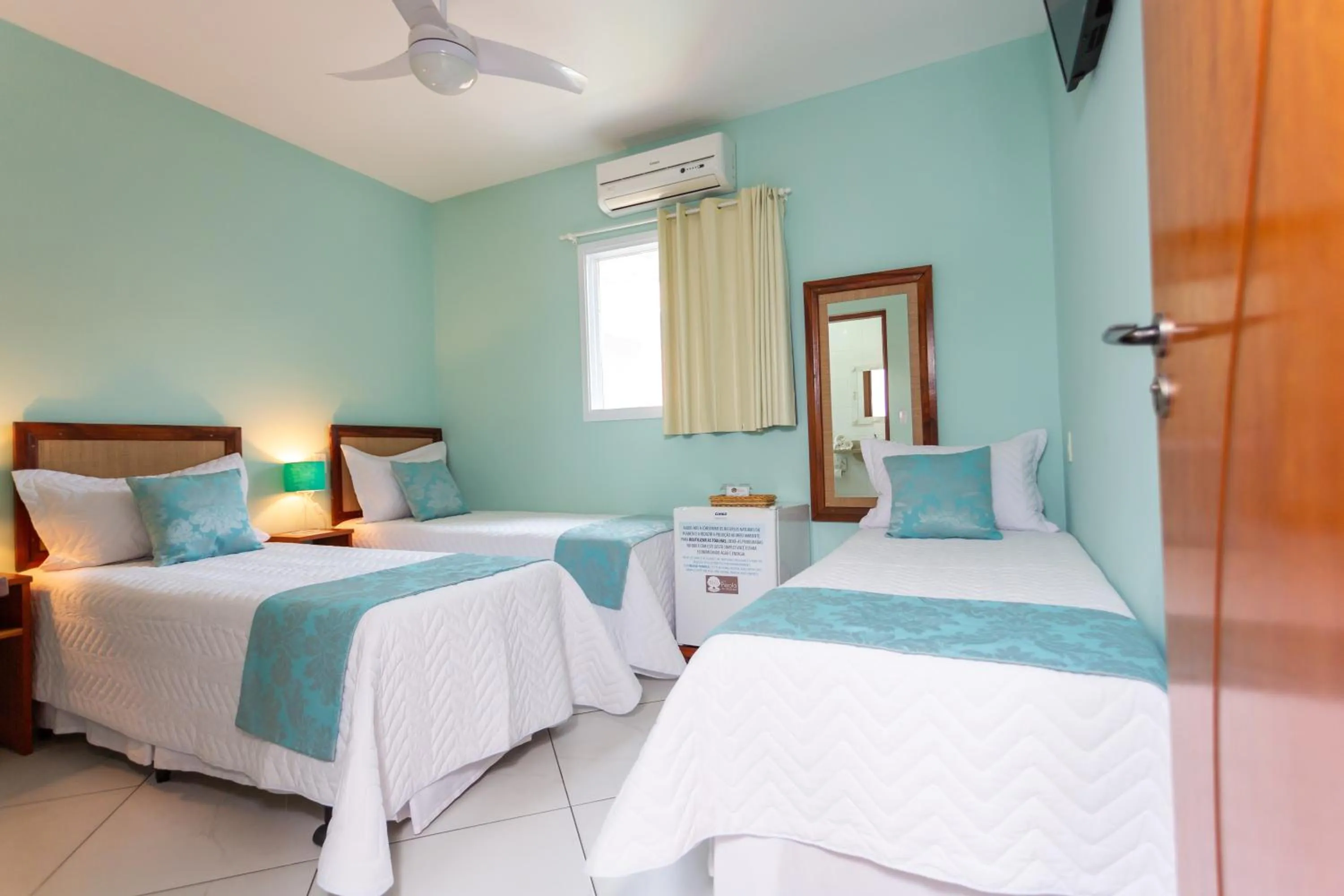 Bed in Pousada Pérola de Ubatuba