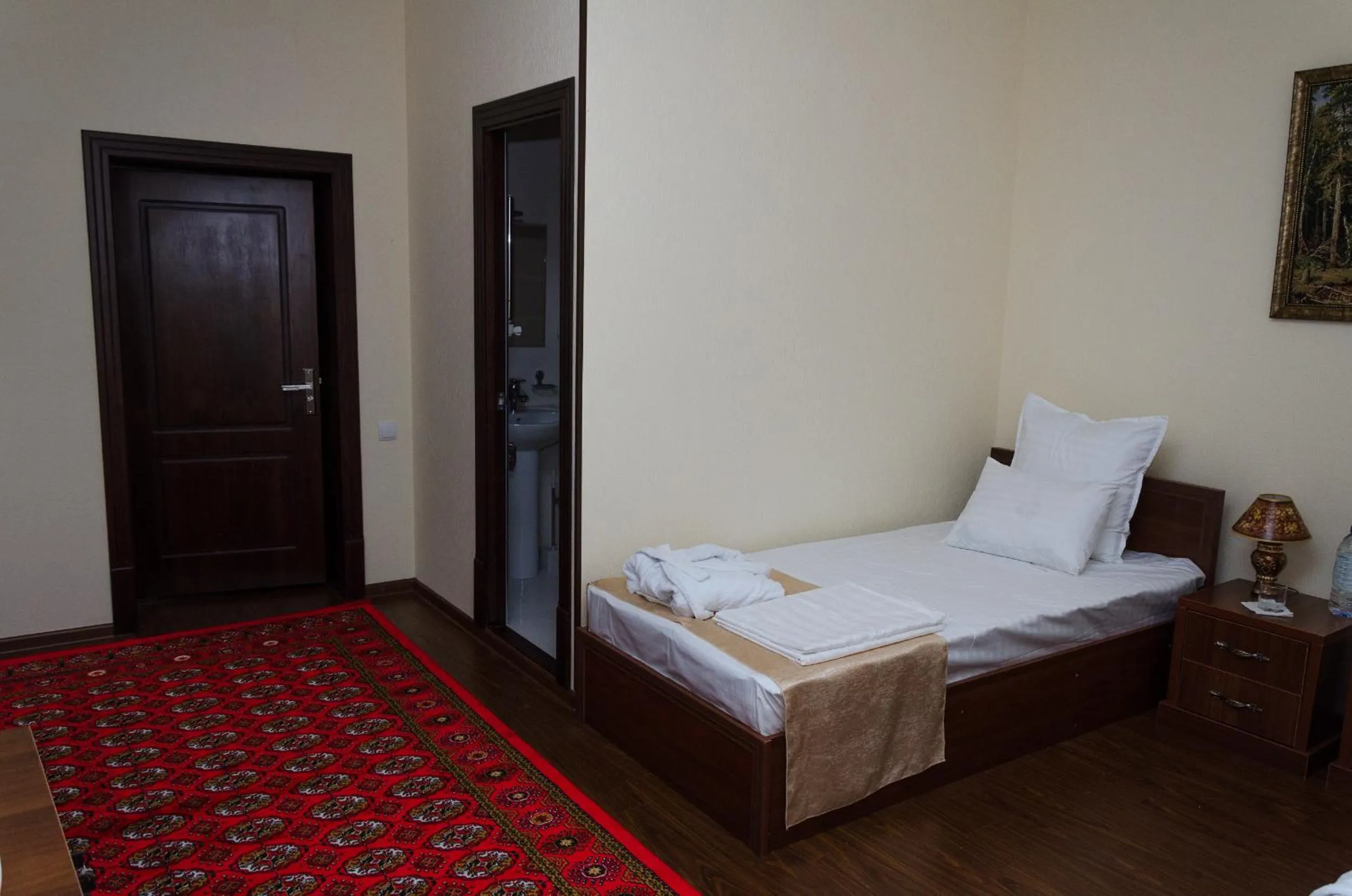Bed in Karakalpak Palace Hotel