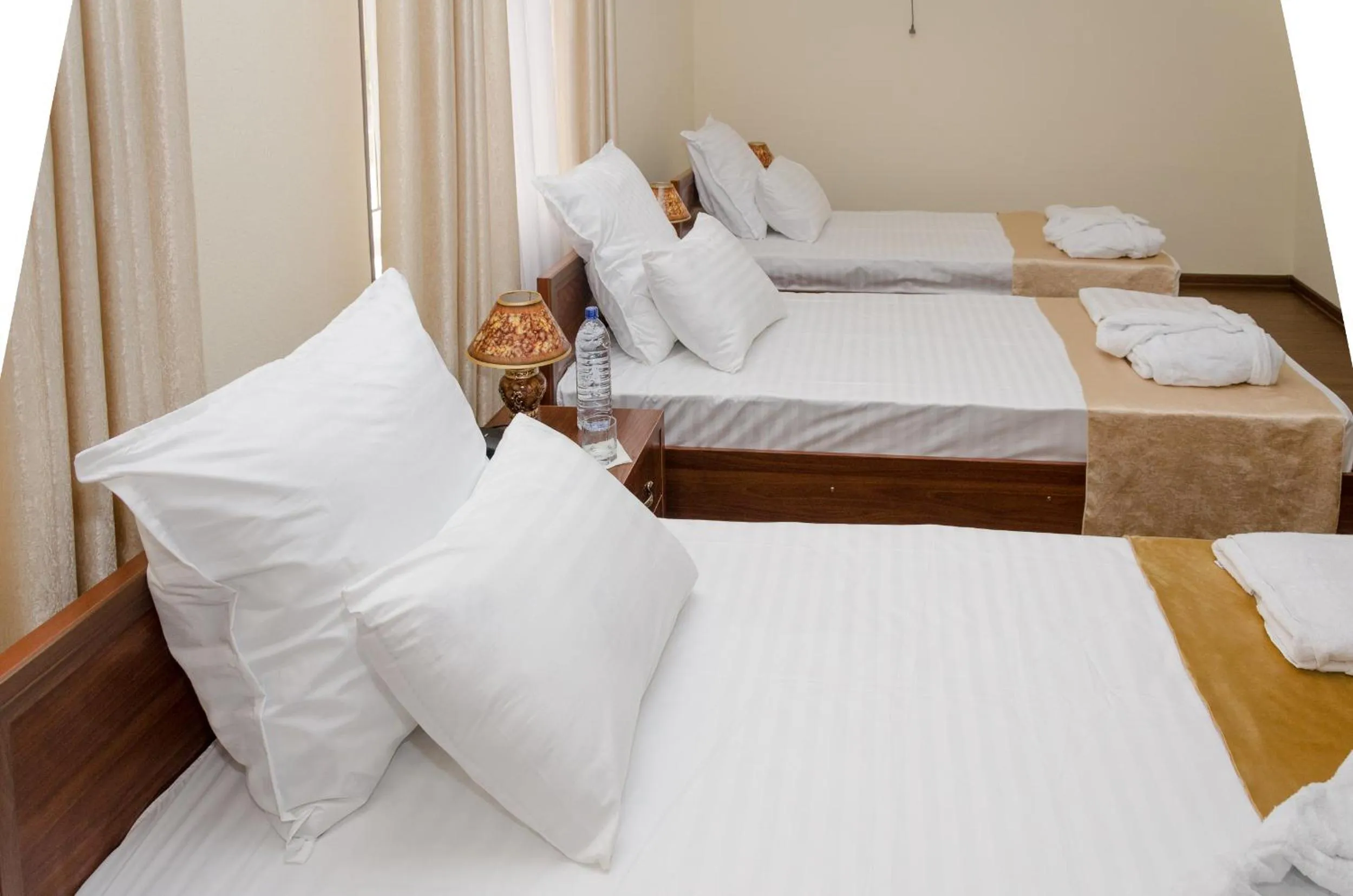 Bed in Karakalpak Palace Hotel