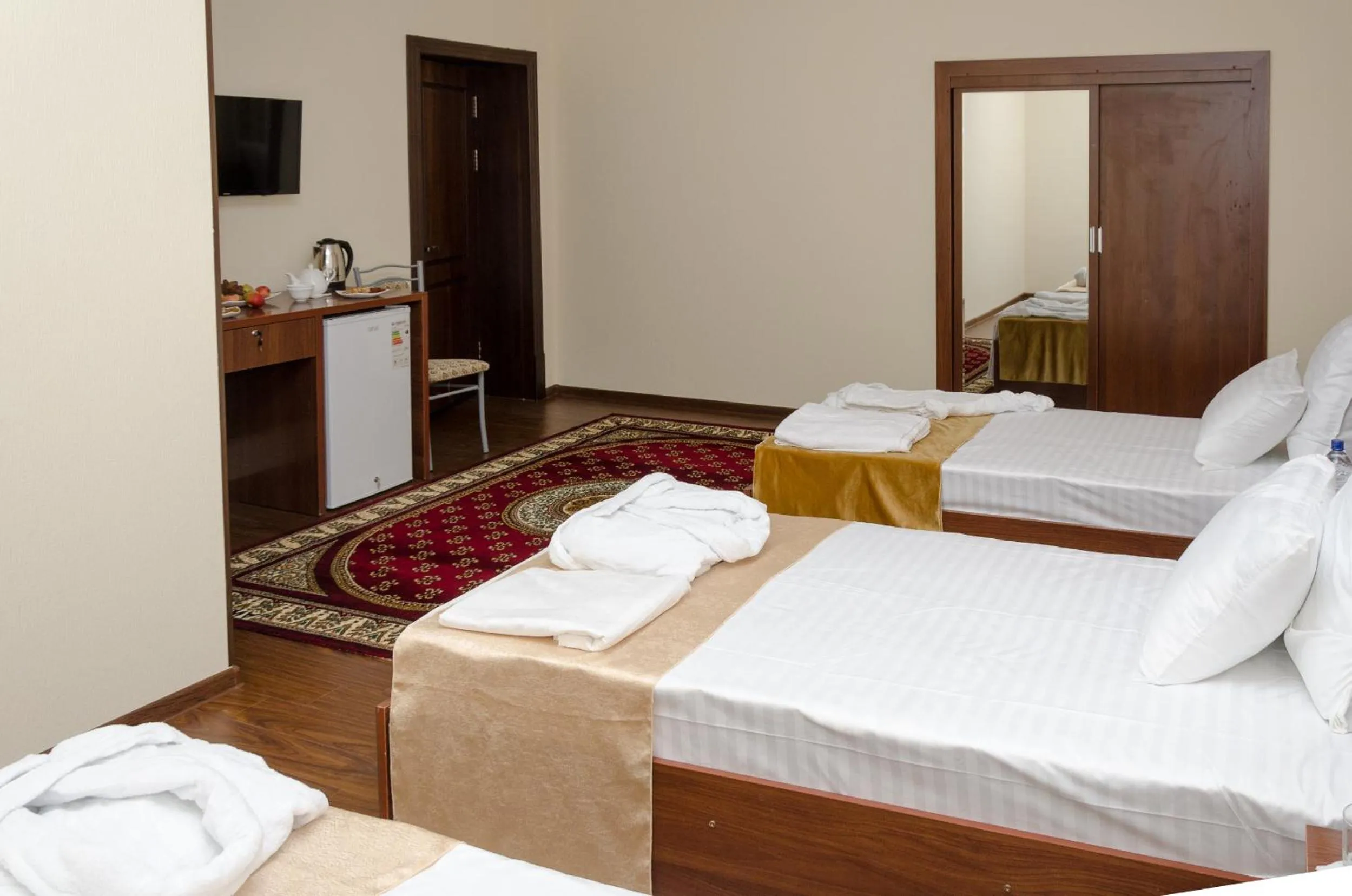 Bed in Karakalpak Palace Hotel