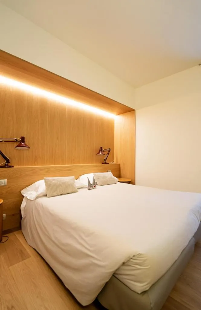 Bed in Albergo Sorriso