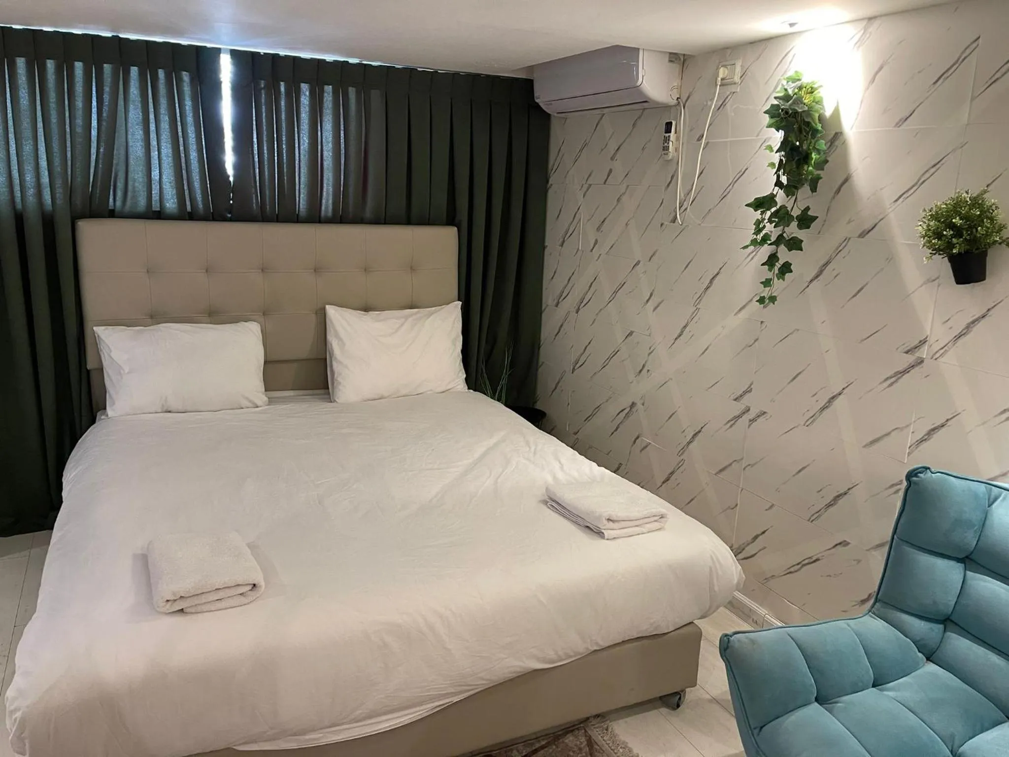 Bed in Lago Suites Hotel