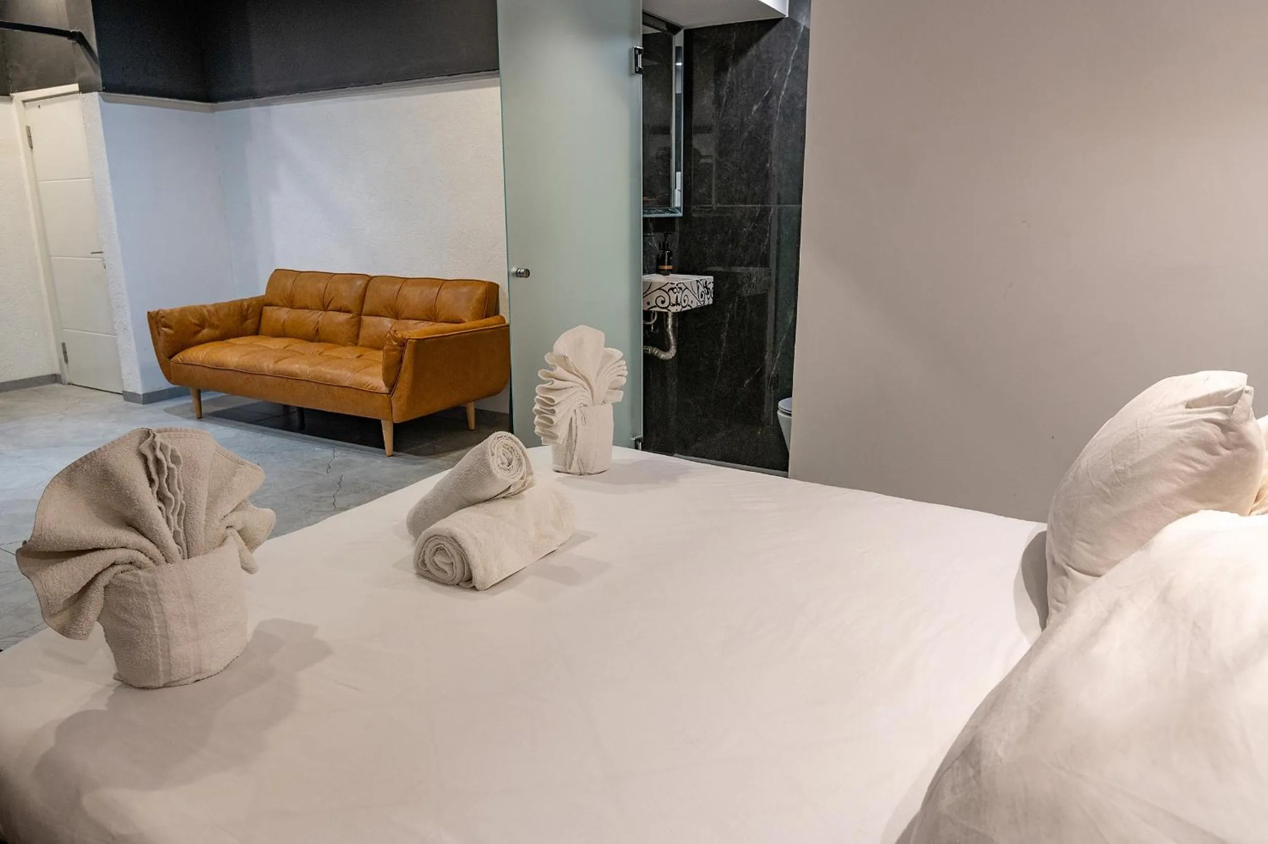 Bed in Lago Suites Hotel