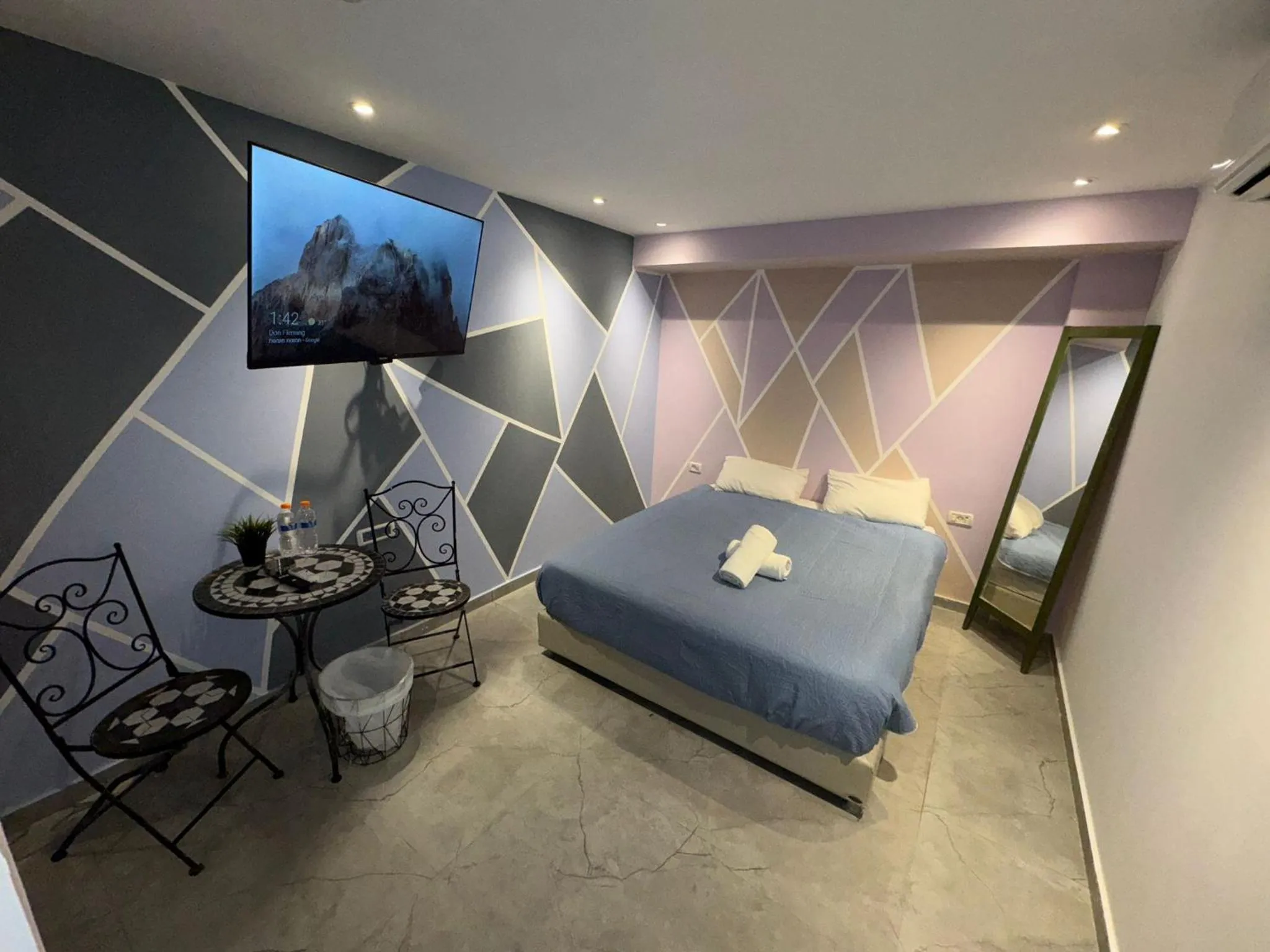 Bed in Lago Suites Hotel