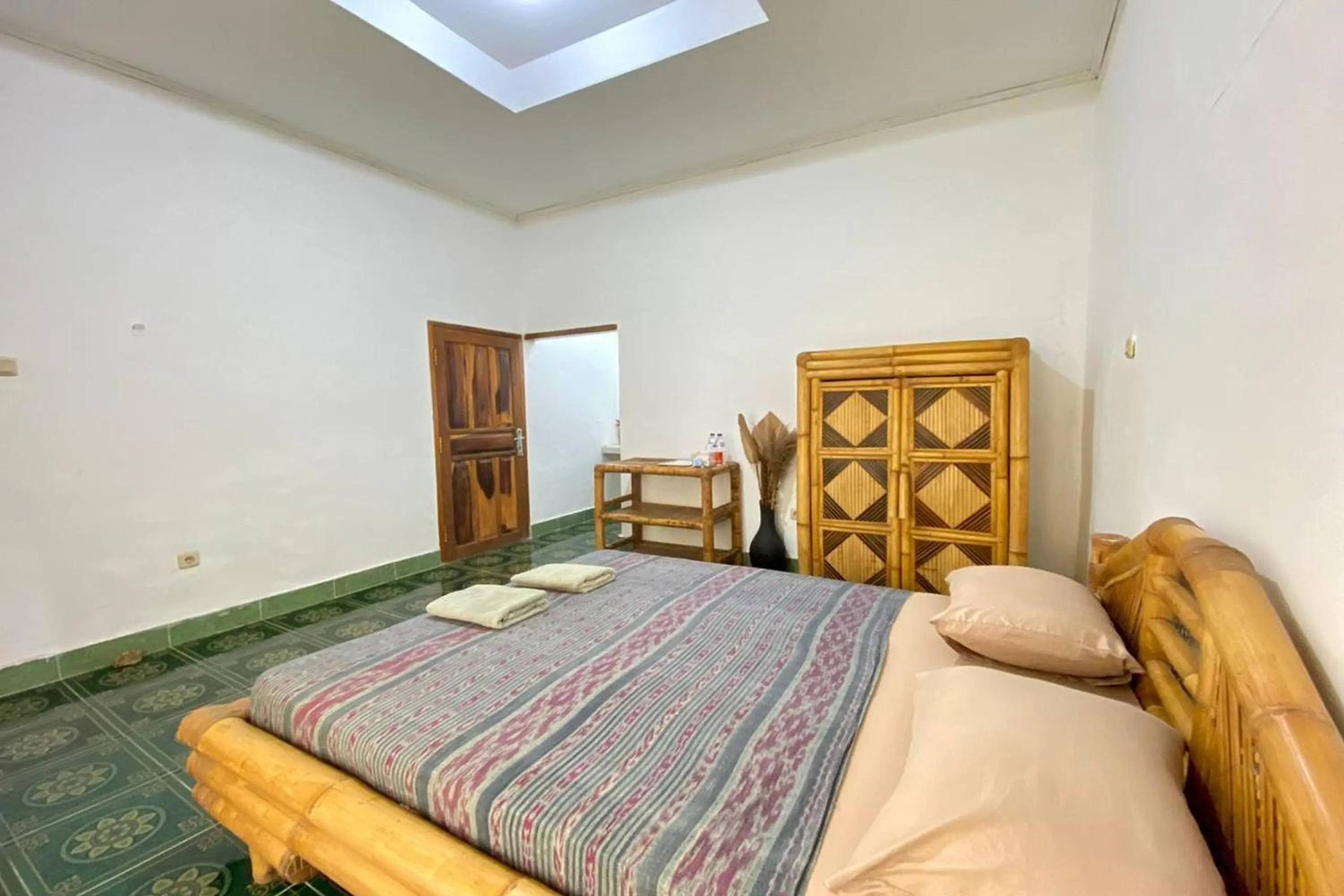 Bed in Duyung Rooms & Resto Gerupuk